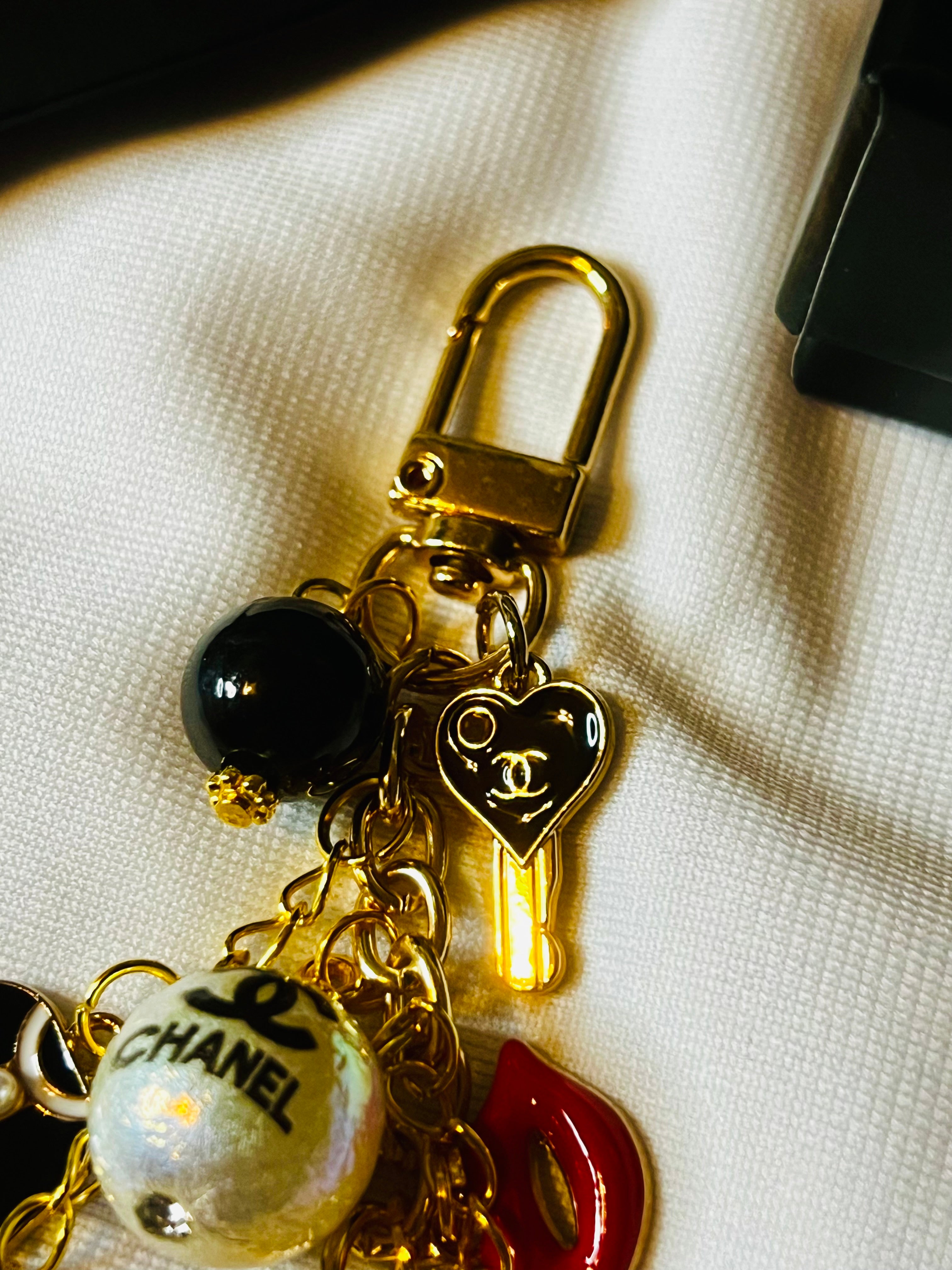 Featuring our CHANEL Luxury Designer Gold Black White Keychain Bag Charm Collection