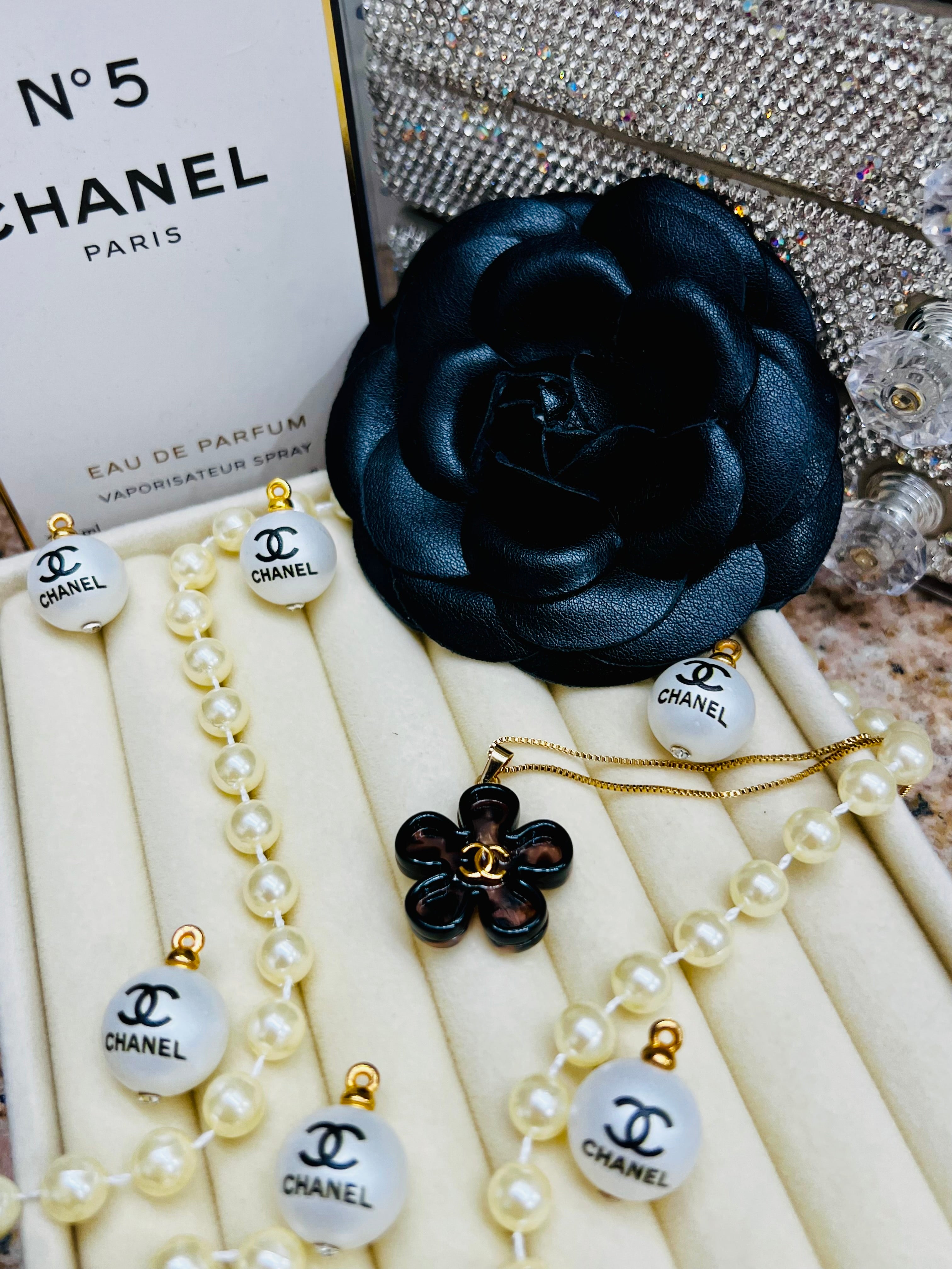 CHANEL Cheetah Print with Gold Lettering Flower Style Pendant Necklace