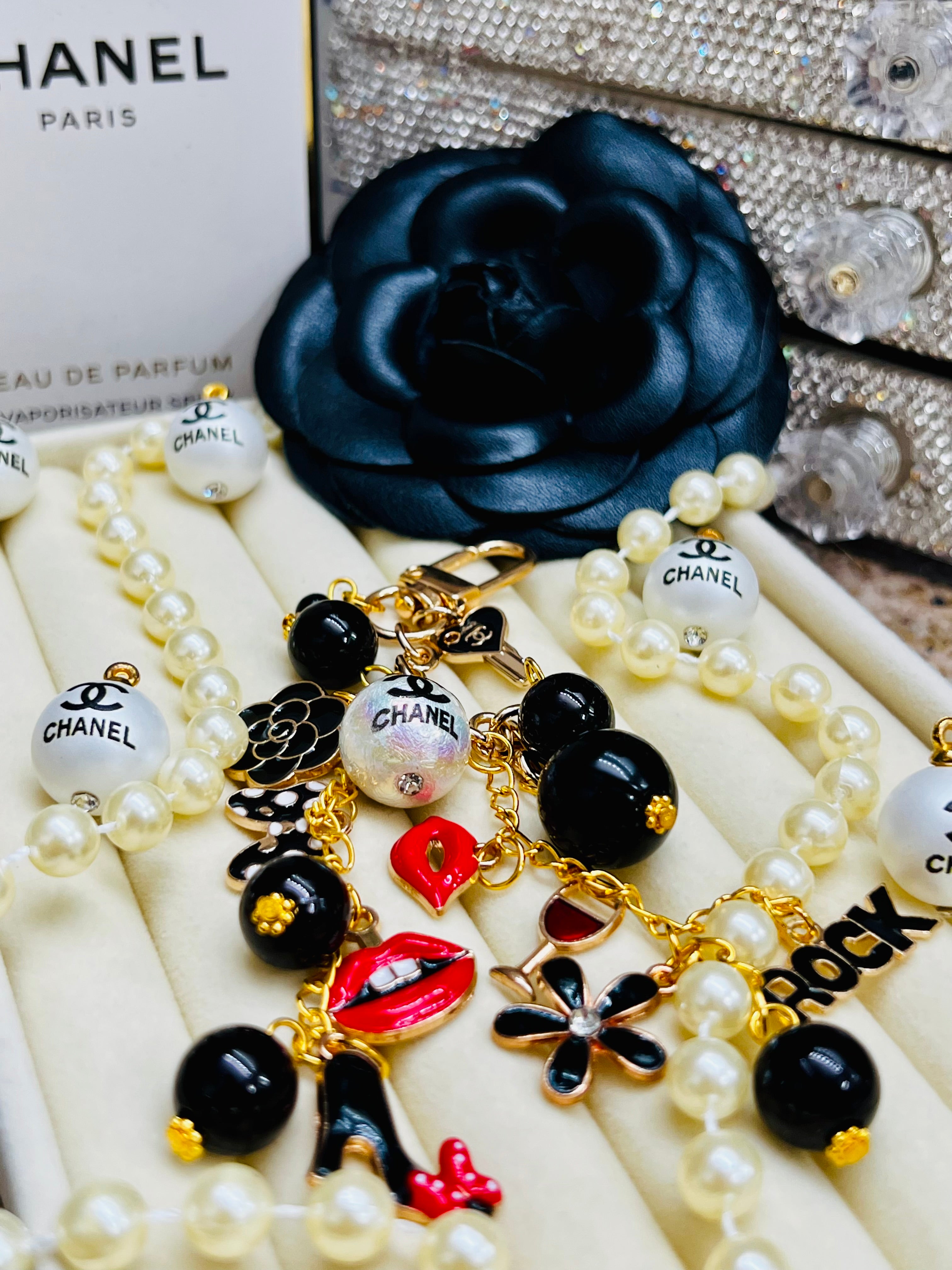 CHANEL Black & Gold Charm Keychain