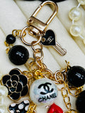 CHANEL Black & Gold Charm Keychain