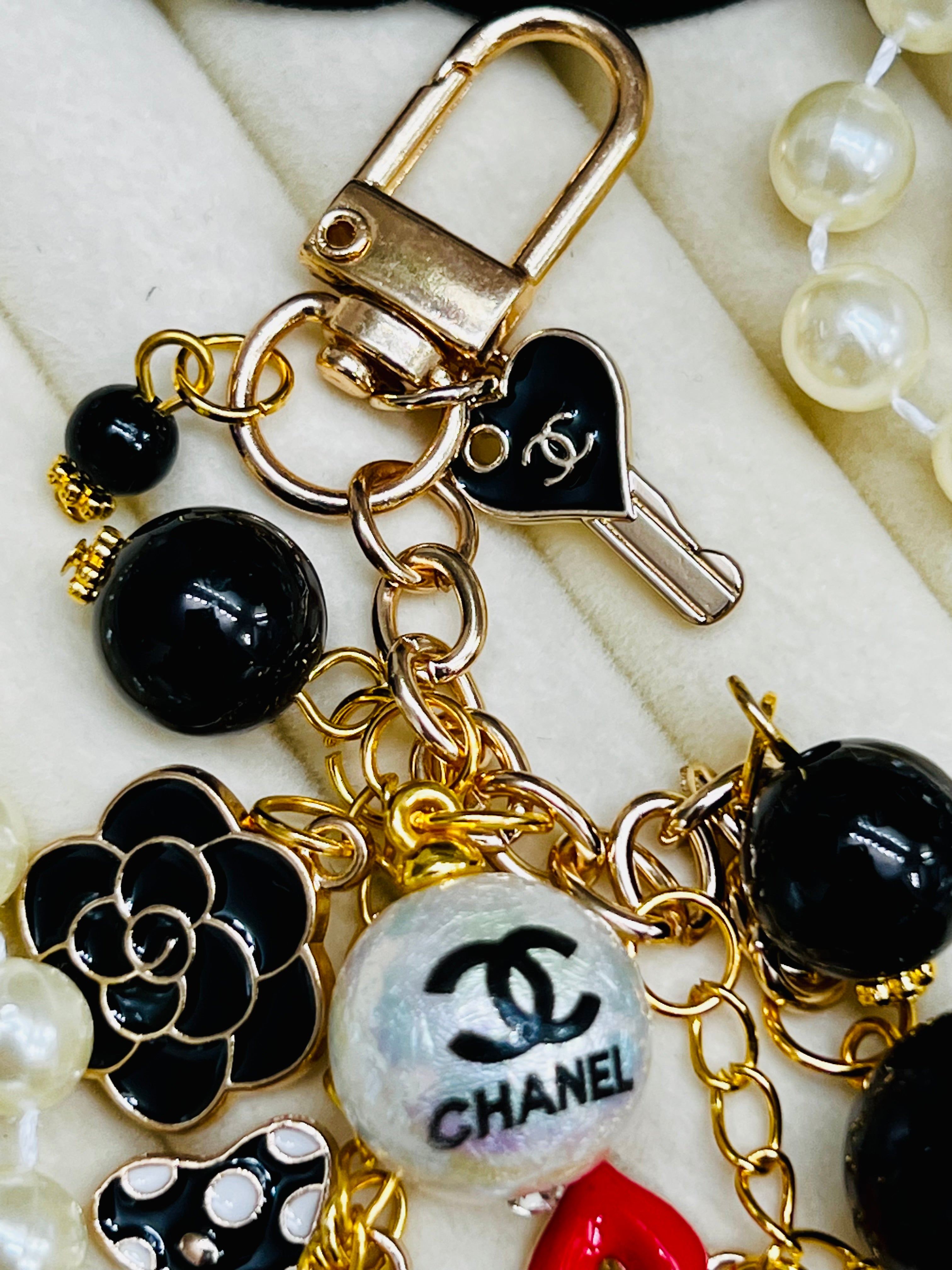 CHANEL Black & Gold Charm Keychain