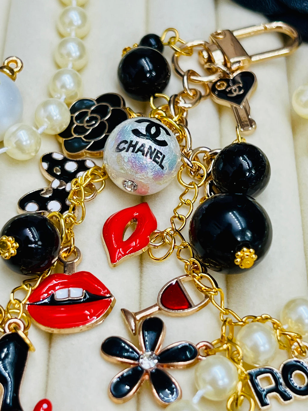 CHANEL Black & Gold Charm Keychain