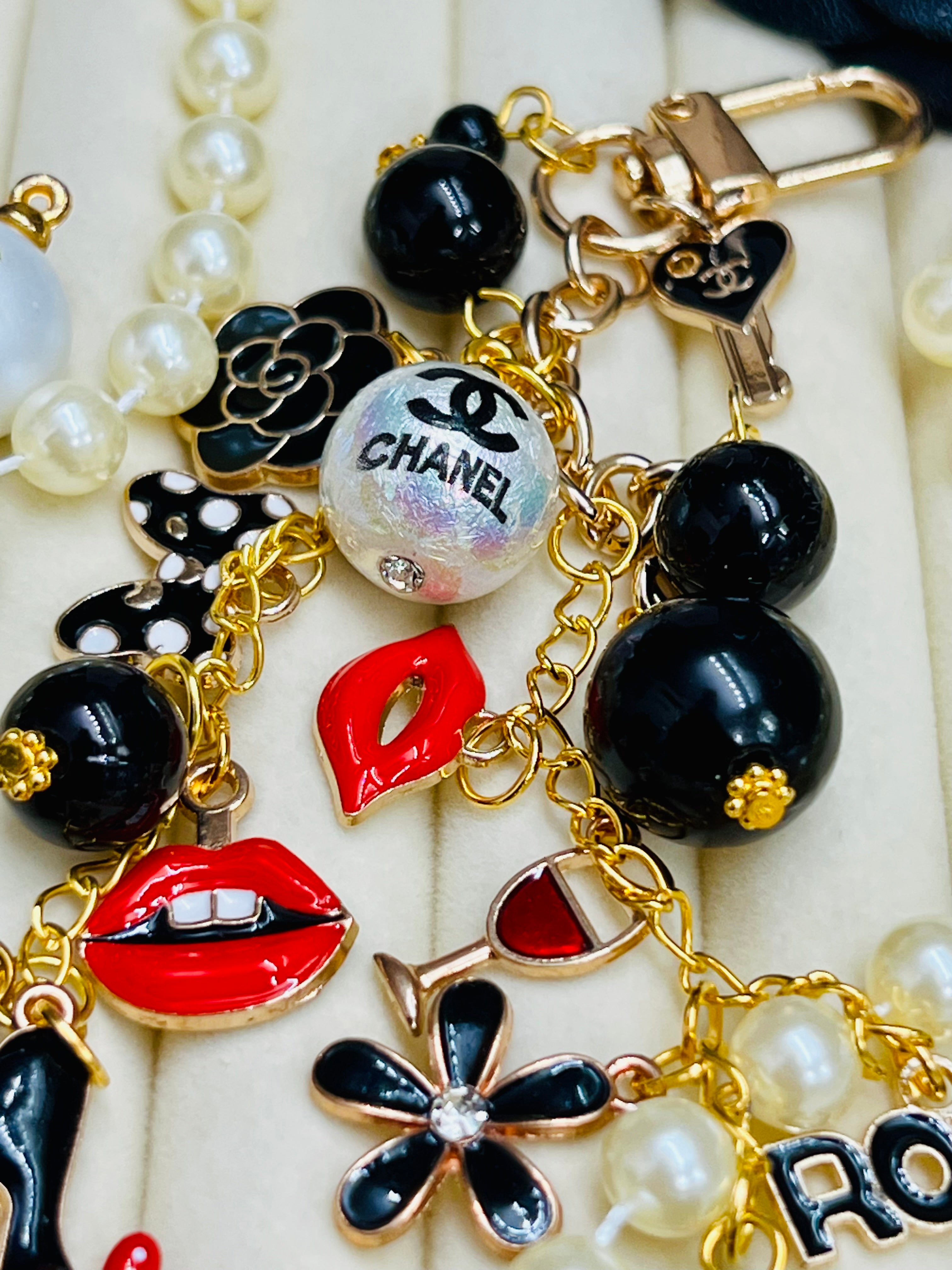 CHANEL Black & Gold Charm Keychain