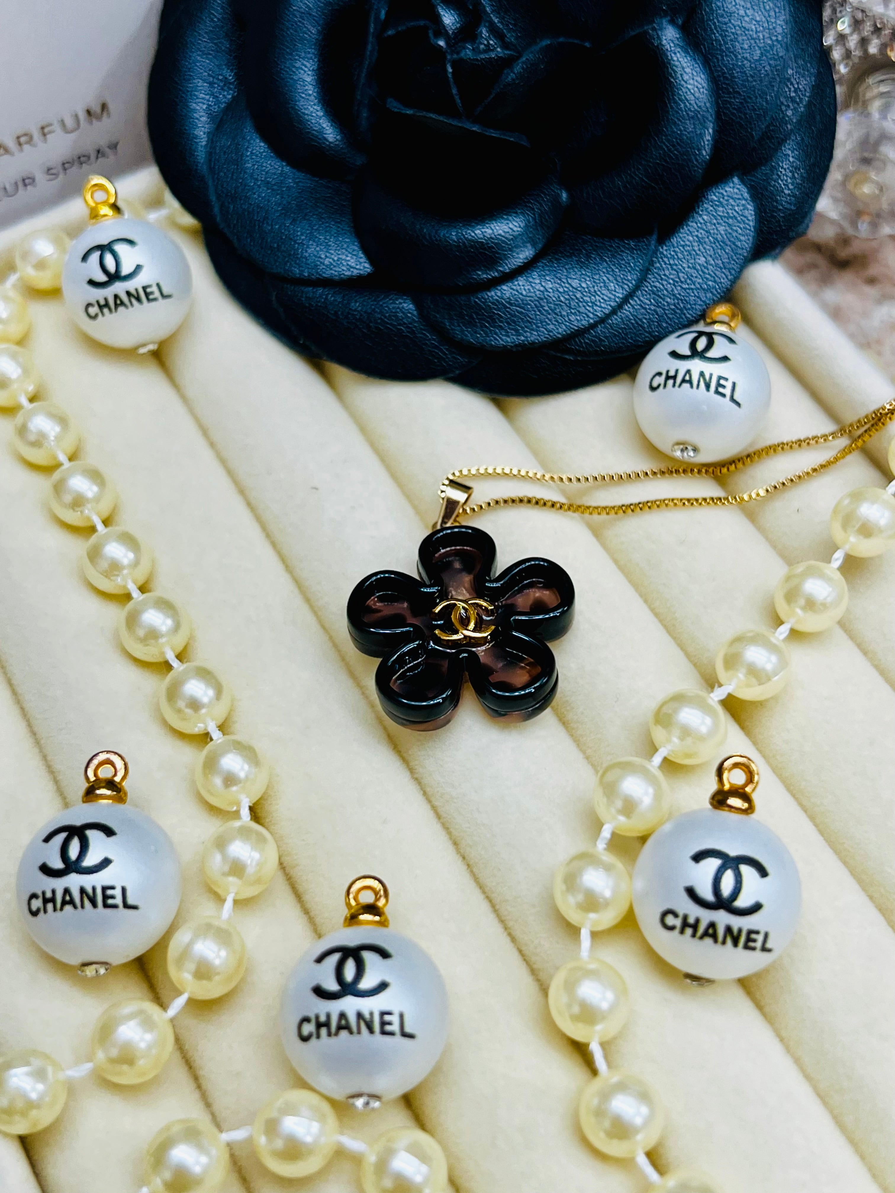 CHANEL Cheetah Print with Gold Lettering Flower Style Pendant Necklace