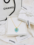 CHANEL Blue Stone with Gold Lettering Heart Pendant Necklace