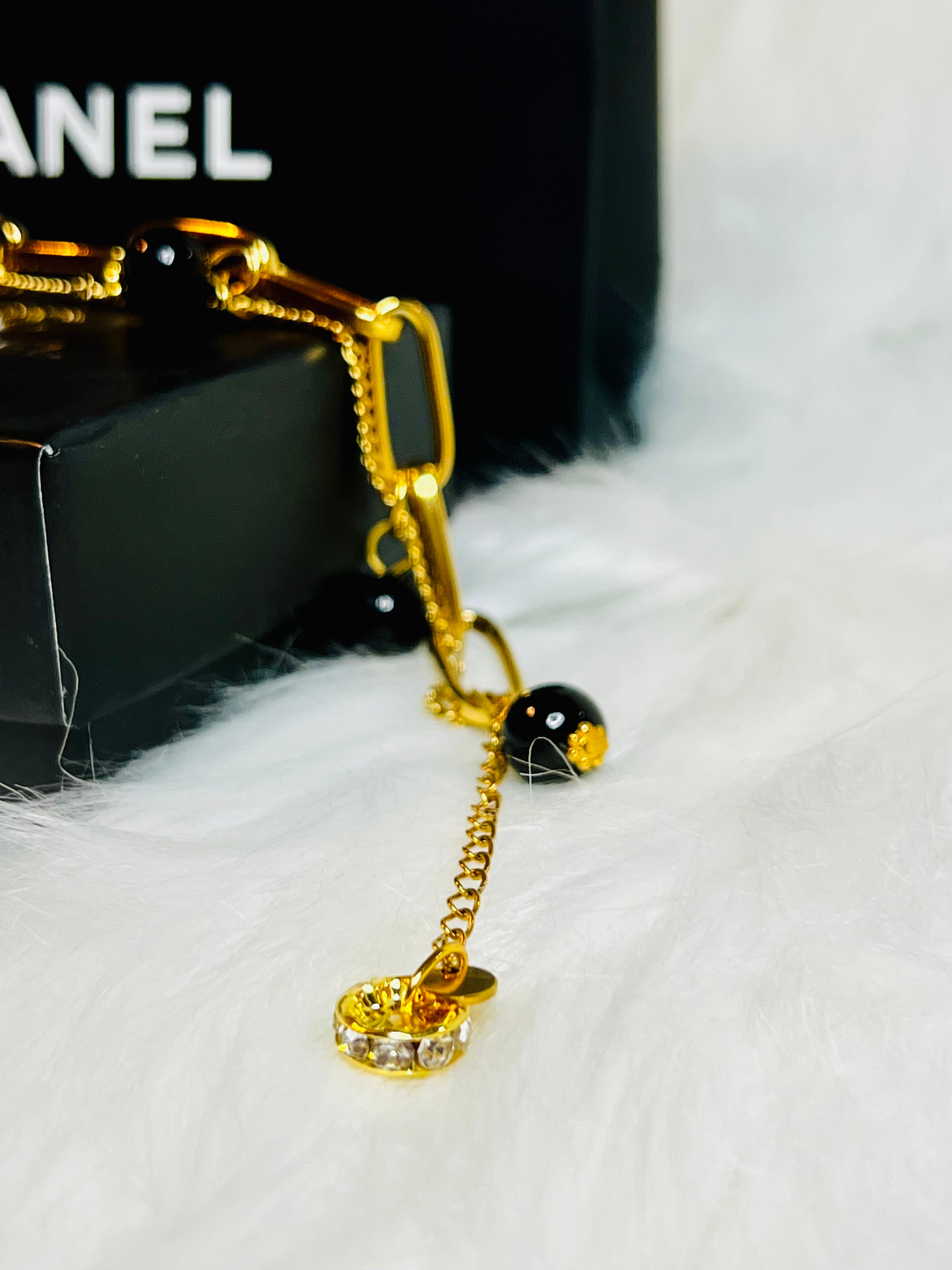 CHANEL Gold & Black Charm Chain Bracelet Heart Dangle