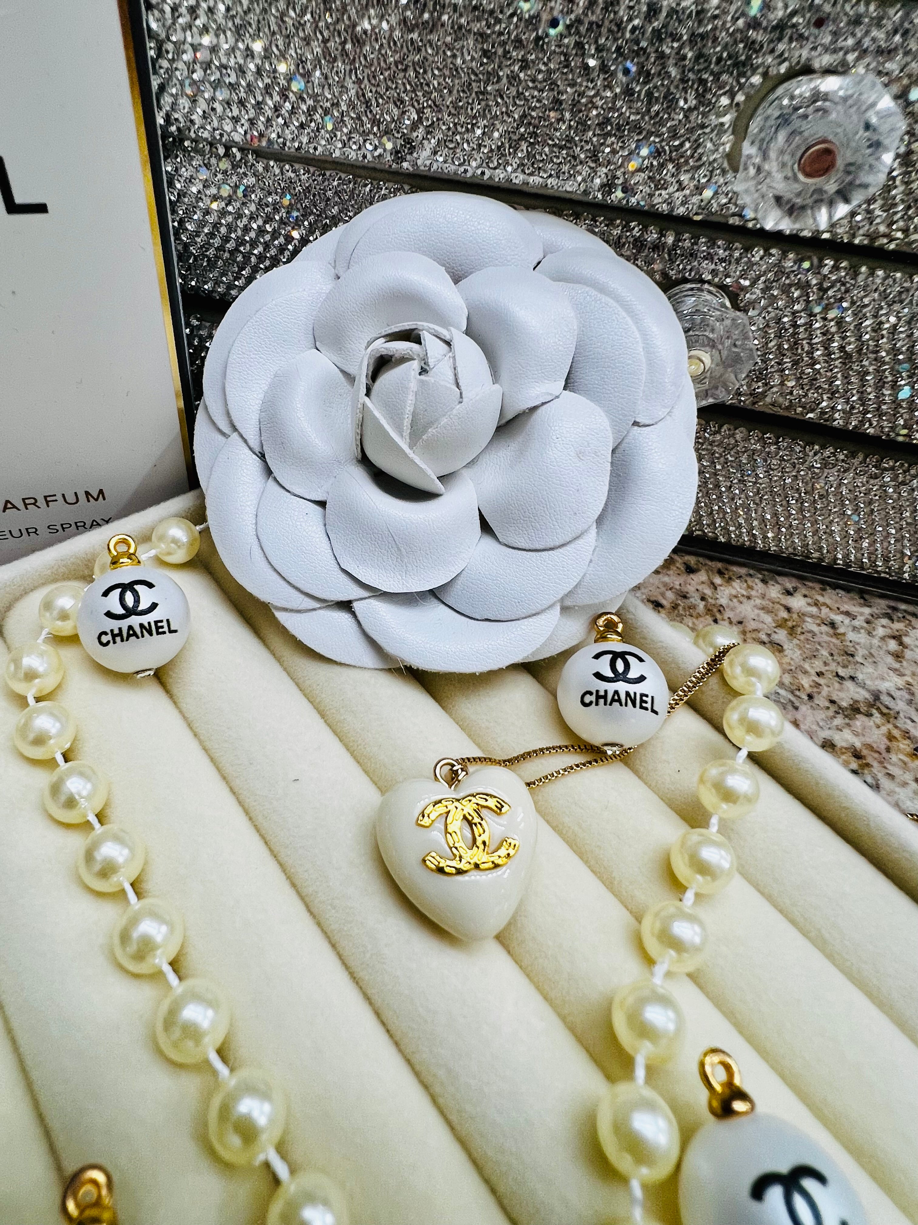 CHANEL White Stone with Gold Lettering Heart Pendant Necklace