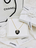 CHANEL Black Stone with Gold Lettering Heart Pendant Necklace