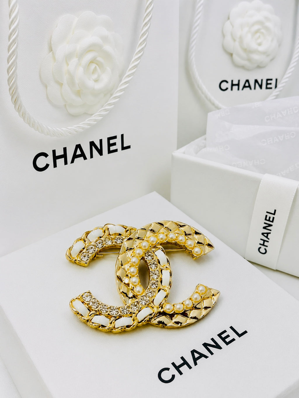 CHANEL Gold & White Leather Braid with Rhinestones Brooch