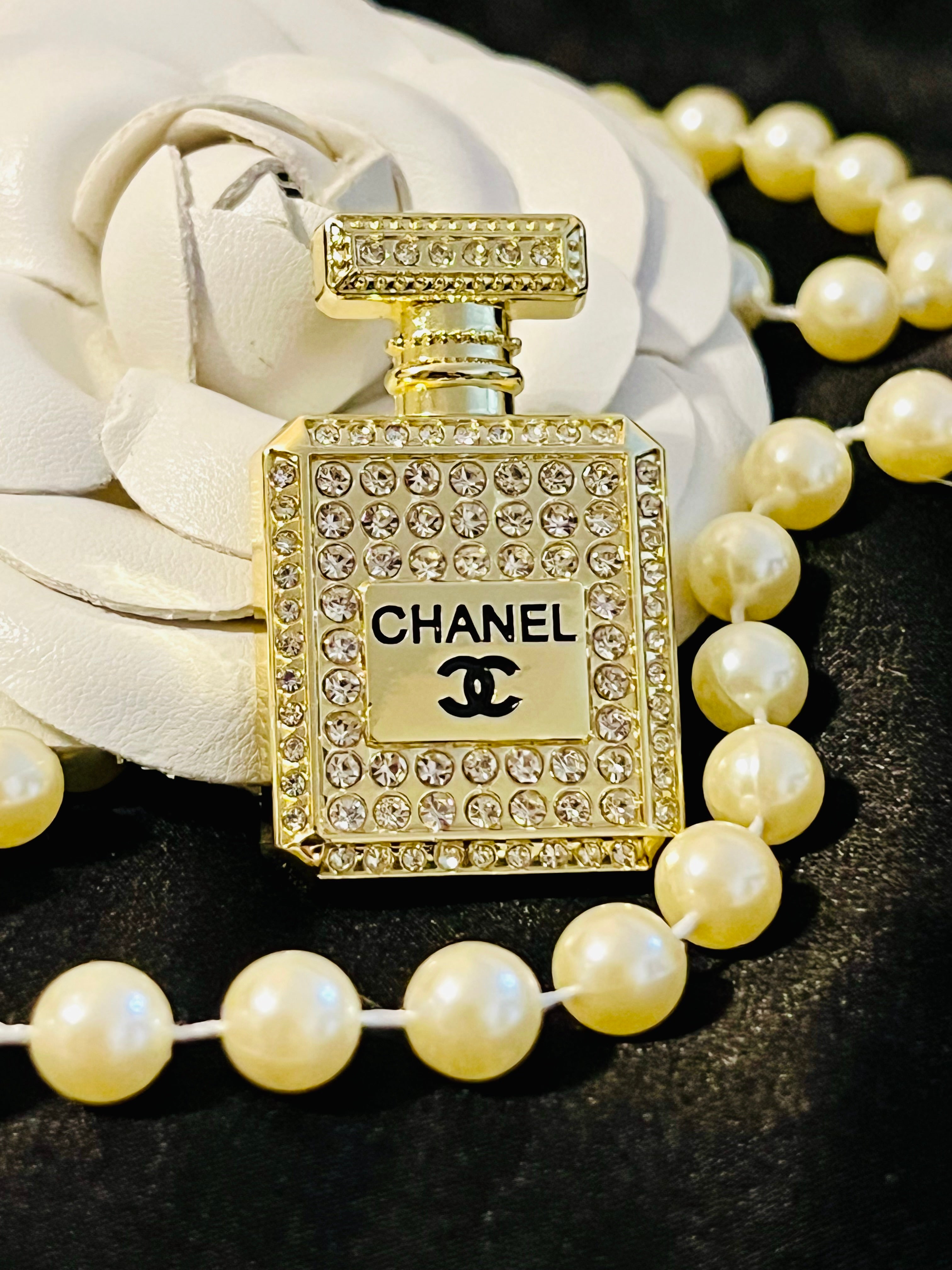 CHANEL Gold with Rhinestone Perfume Bottle Brooch