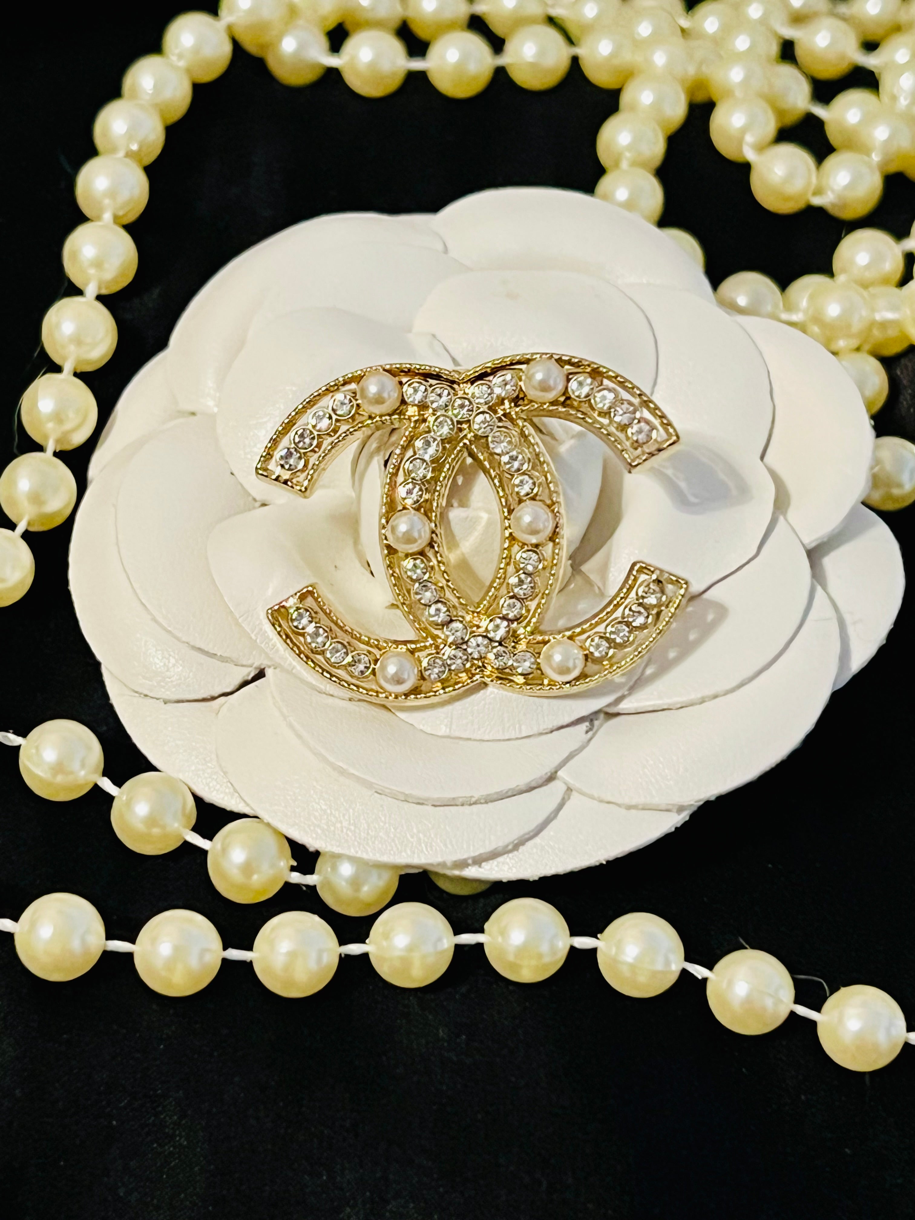 Stunning CHANEL Gold Crystal Brooch with Pearl Accents