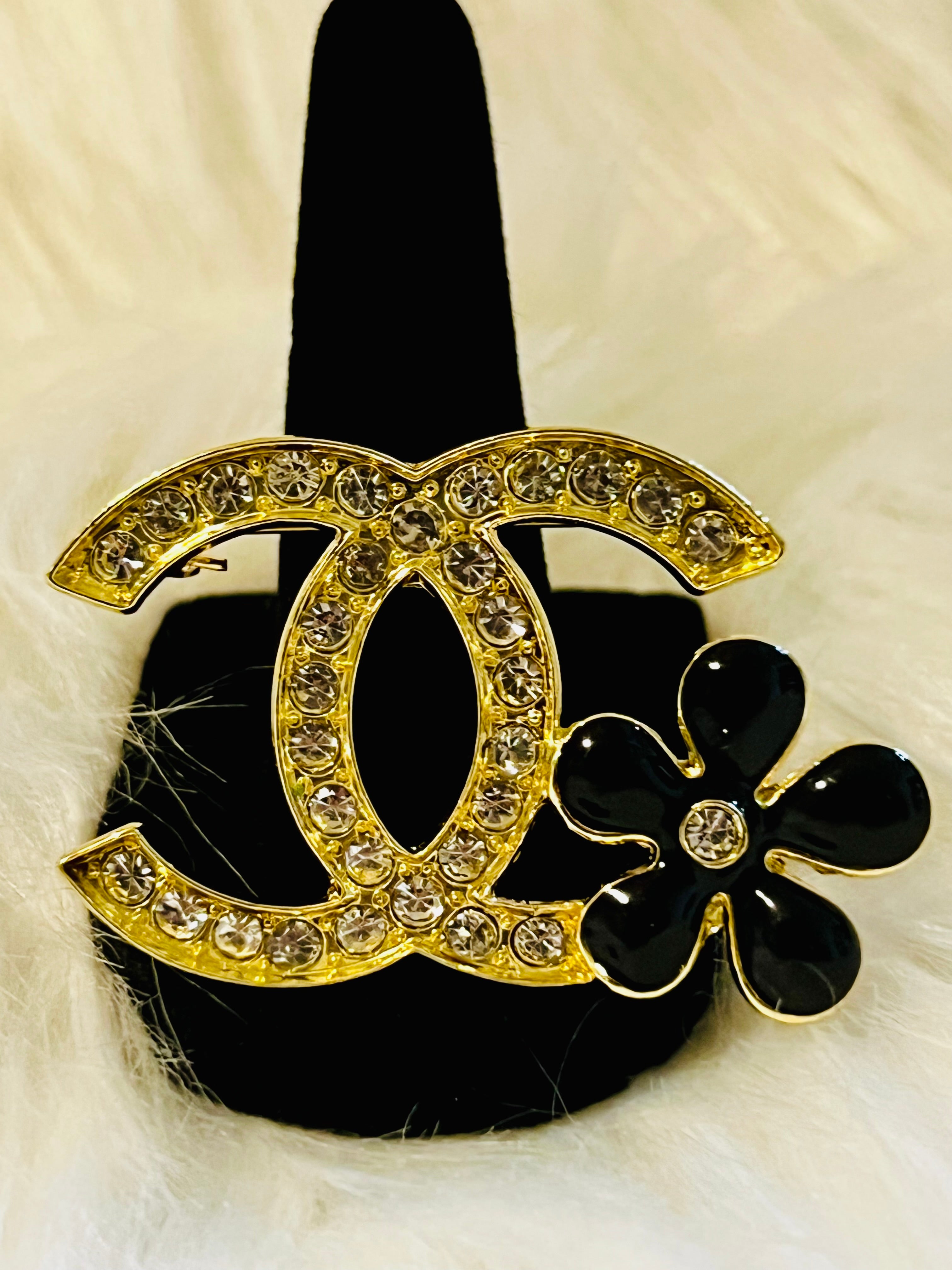 CHANEL Gold Rhinestone with Black Flower Brooch