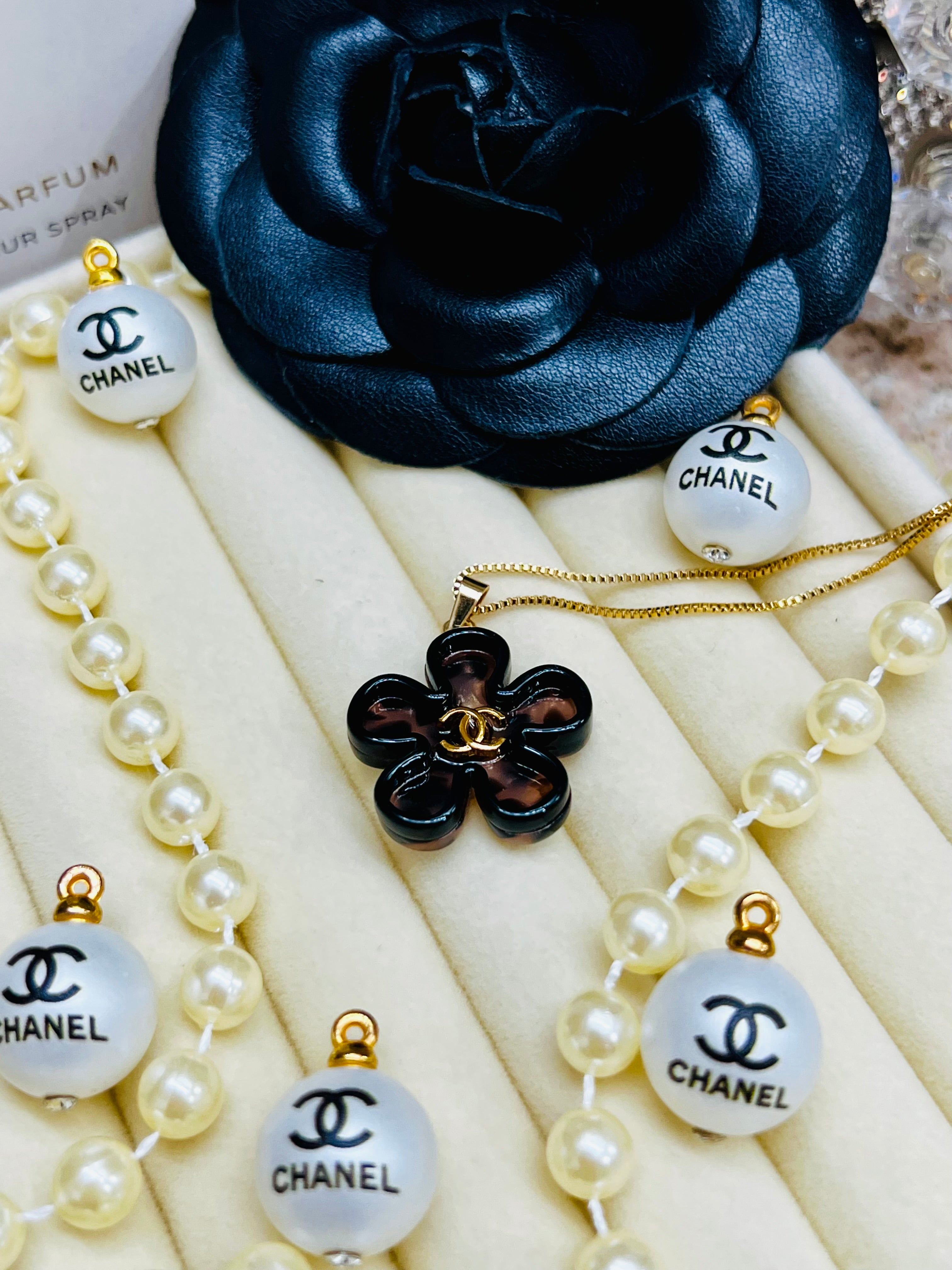 CHANEL Cheetah Print with Gold Lettering Flower Style Pendant Necklace