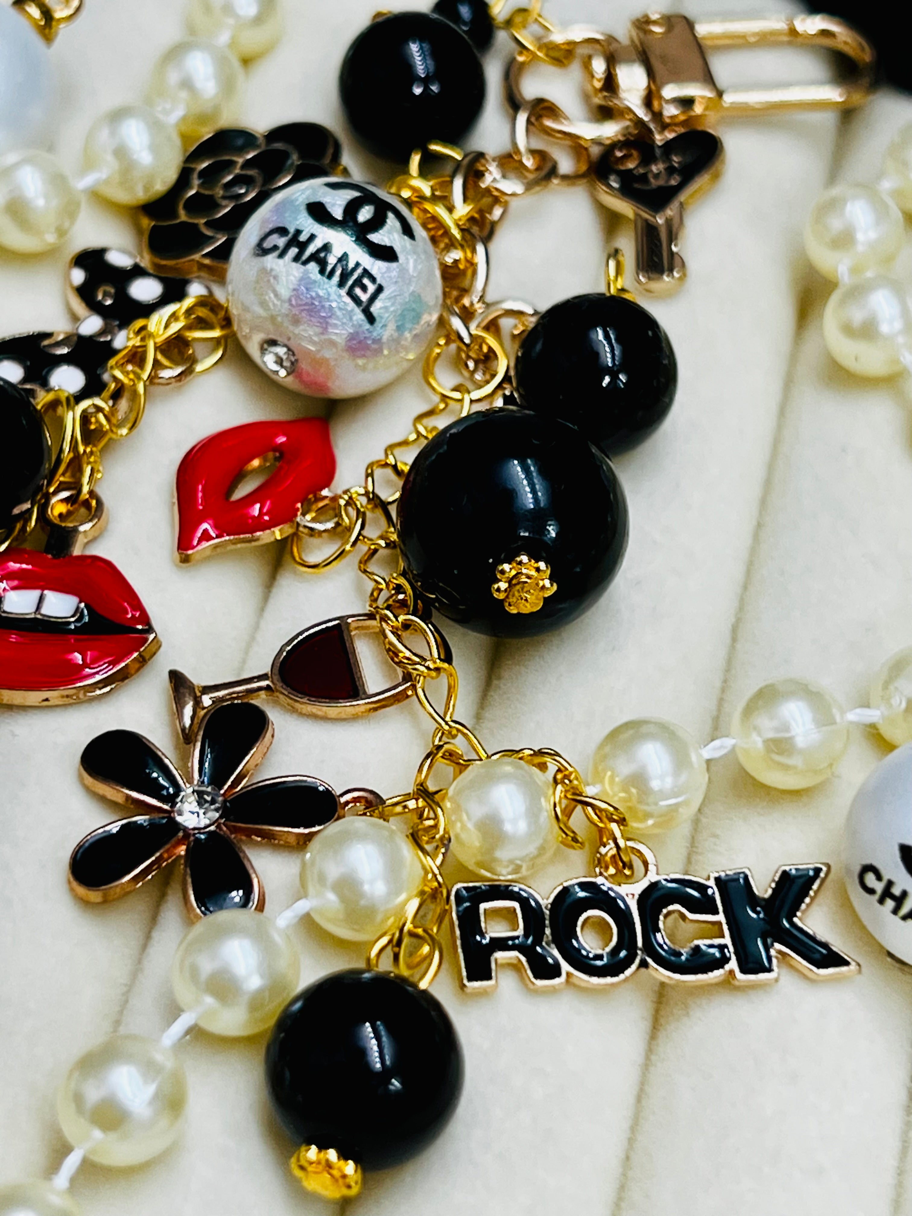 CHANEL Black & Gold Charm Keychain