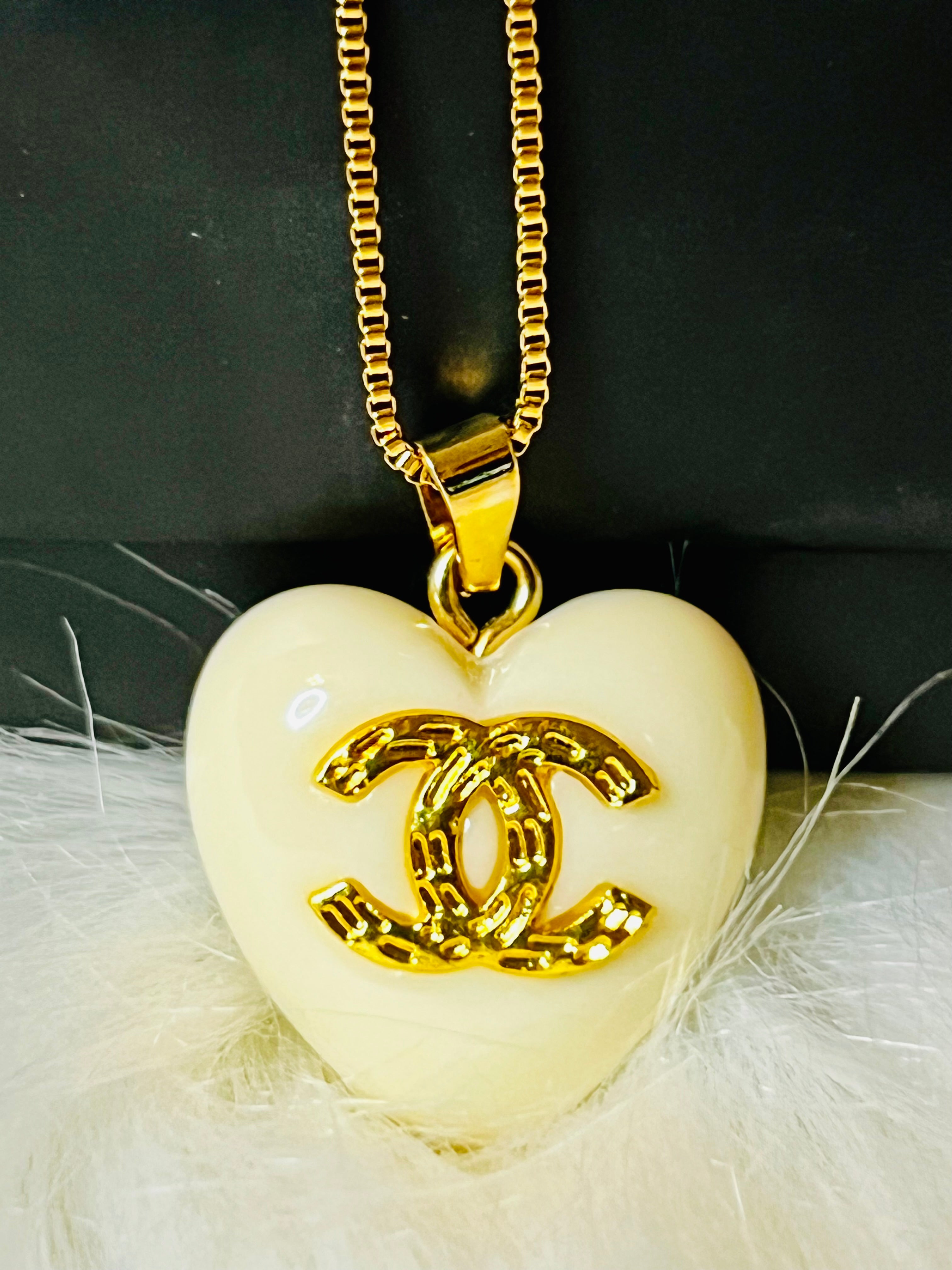 CHANEL White Stone with Gold Lettering Heart Pendant Necklace