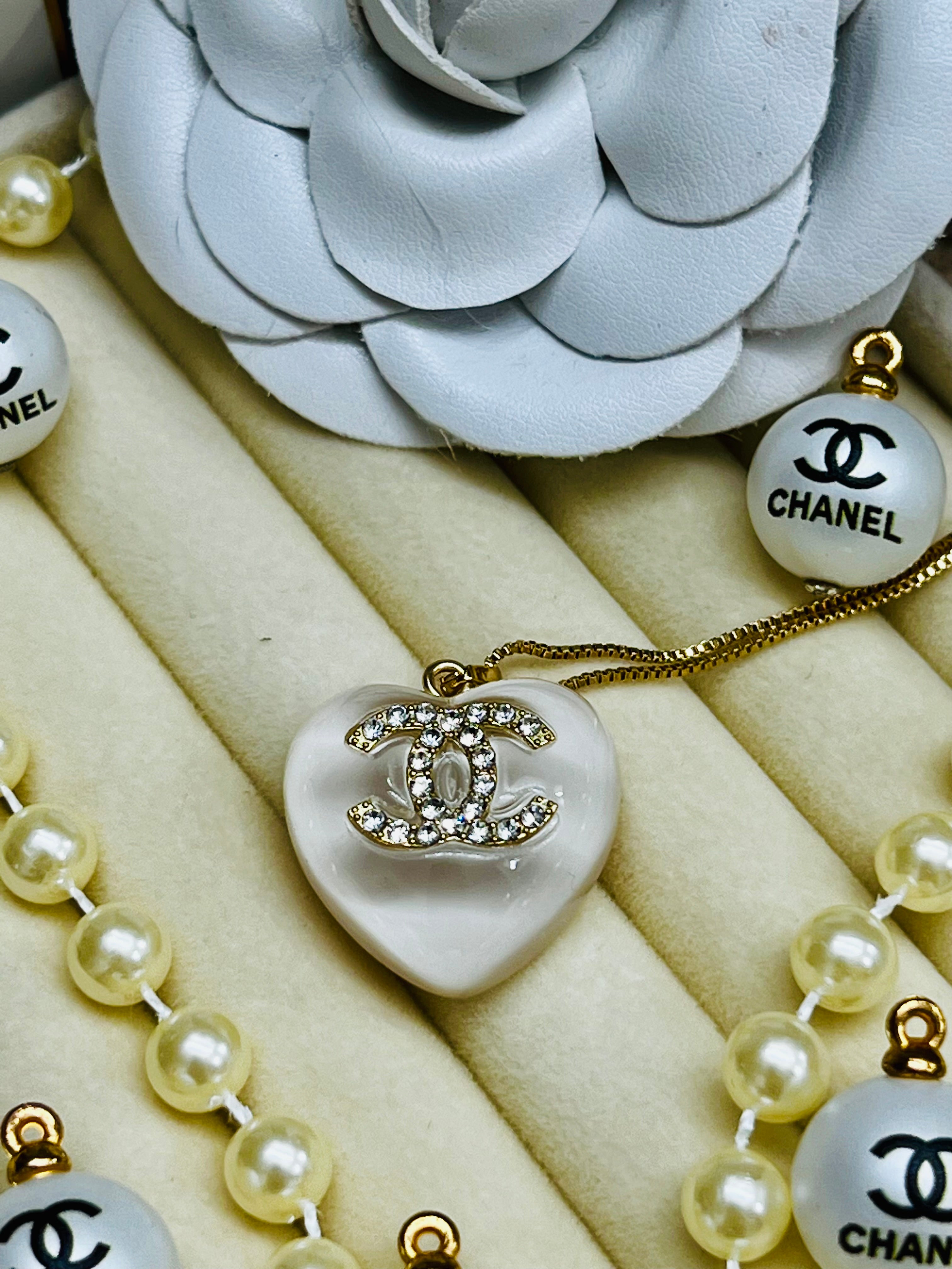 CHANEL White Stone with Gold Lettering Heart Pendant Necklace