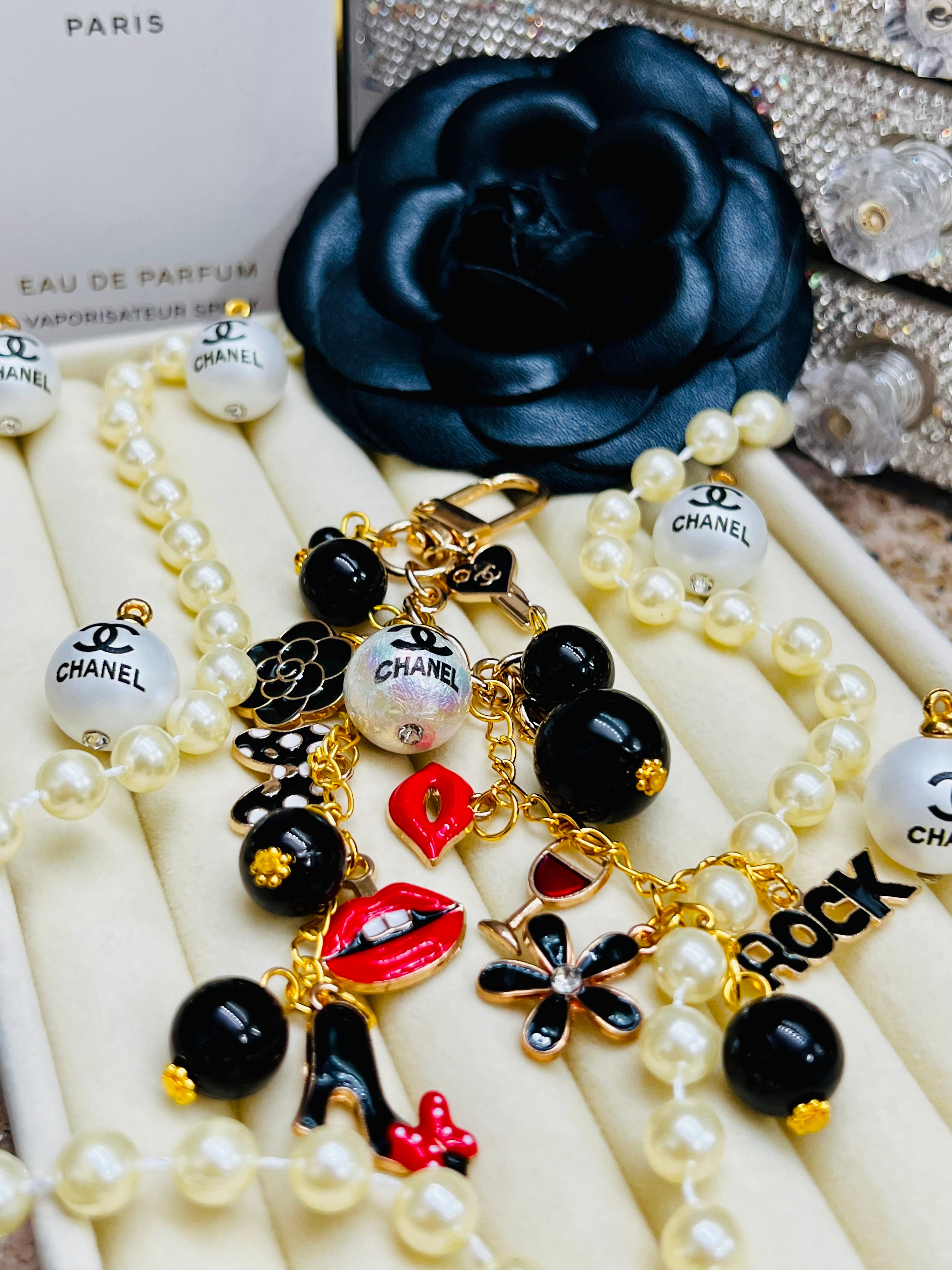 CHANEL Black & Gold Charm Keychain