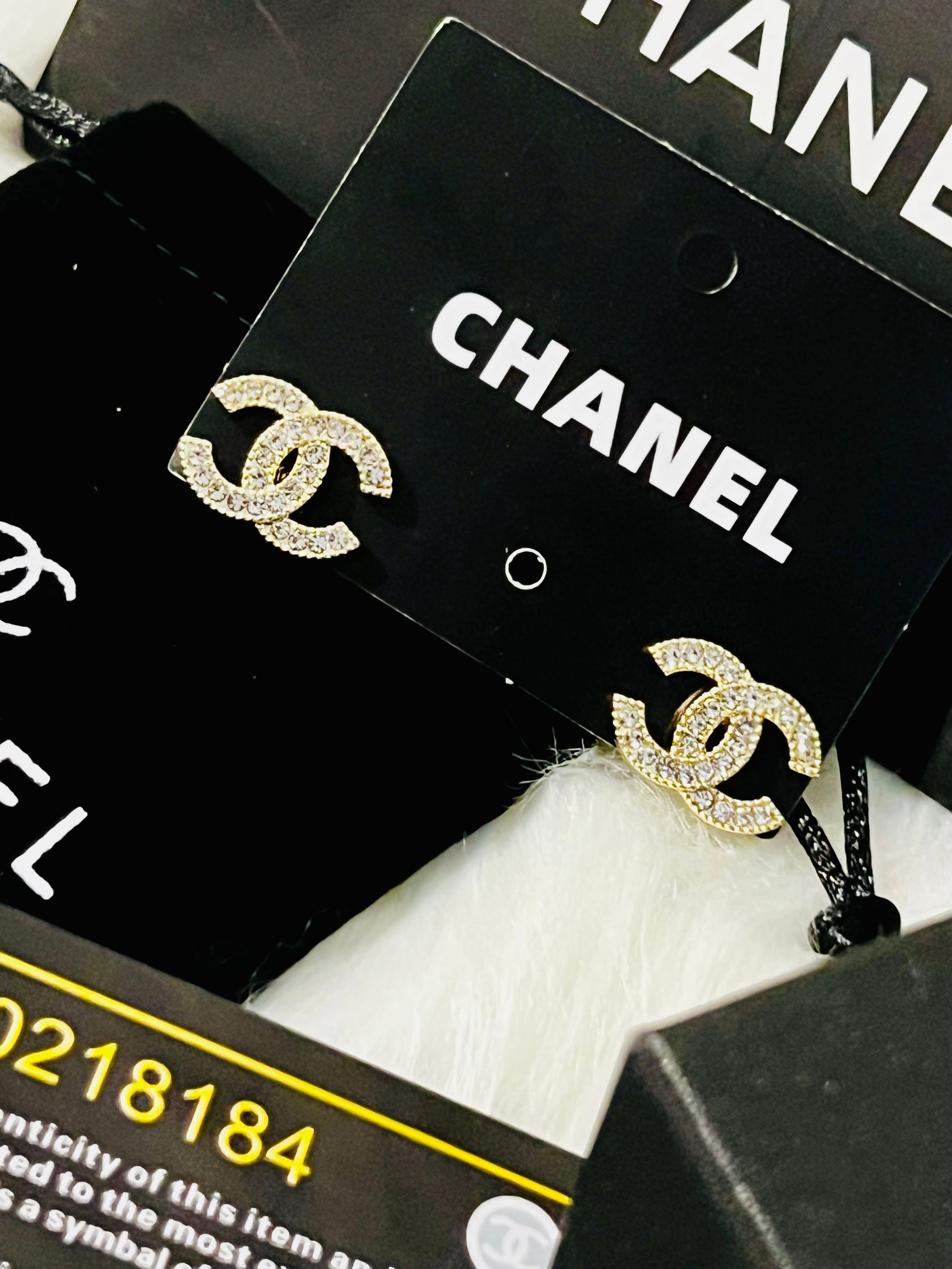 CHANEL Gold with Rhinestone Accent Stud Earrings