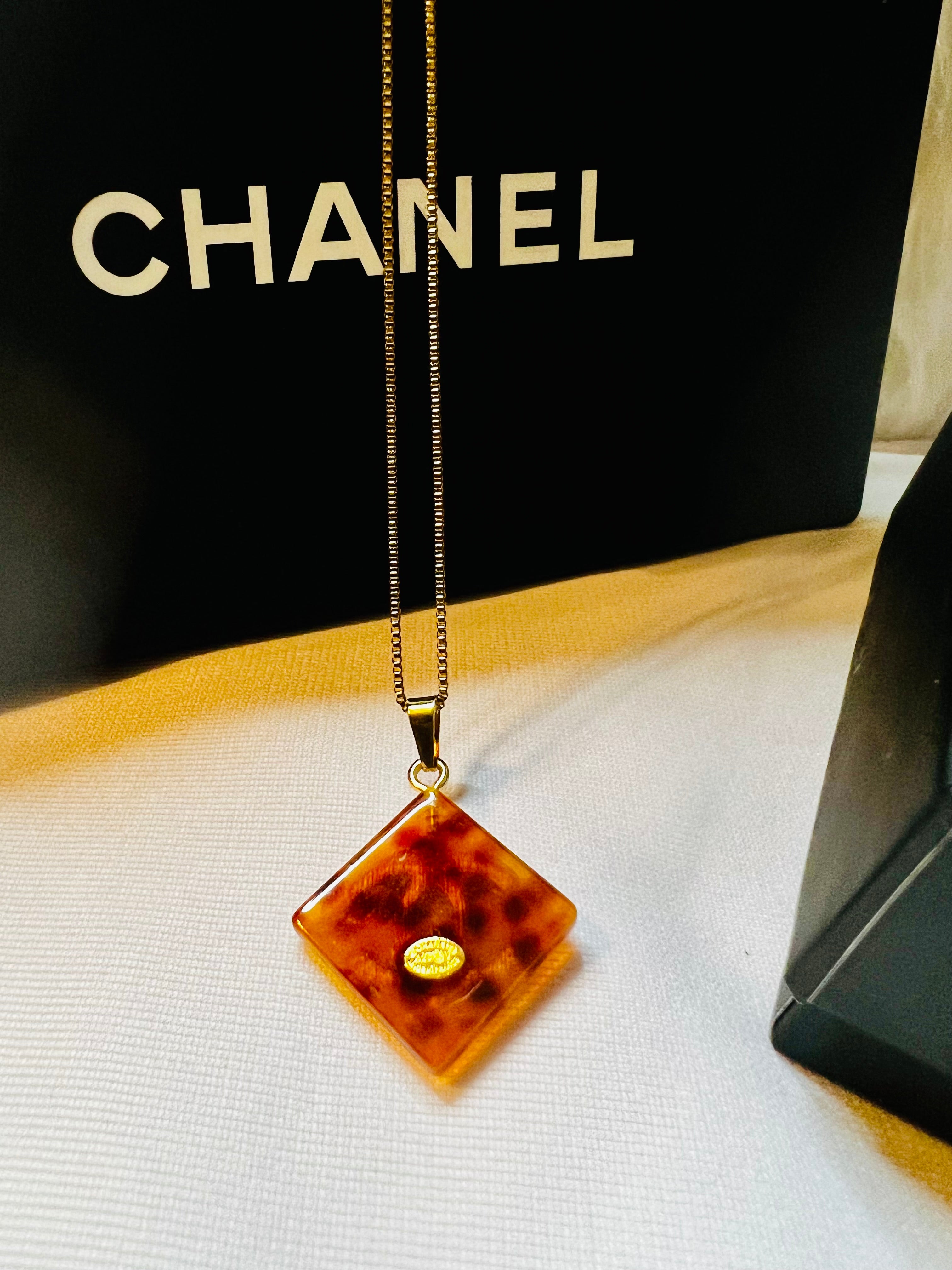 CHANEL Cheetah Print with Gold Lettering Diamond Pendant Necklace