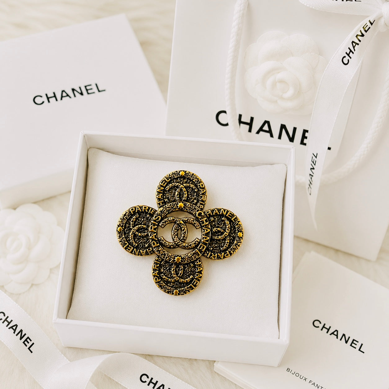 Urbane Bronze Chanel Logo Ancient Brooch