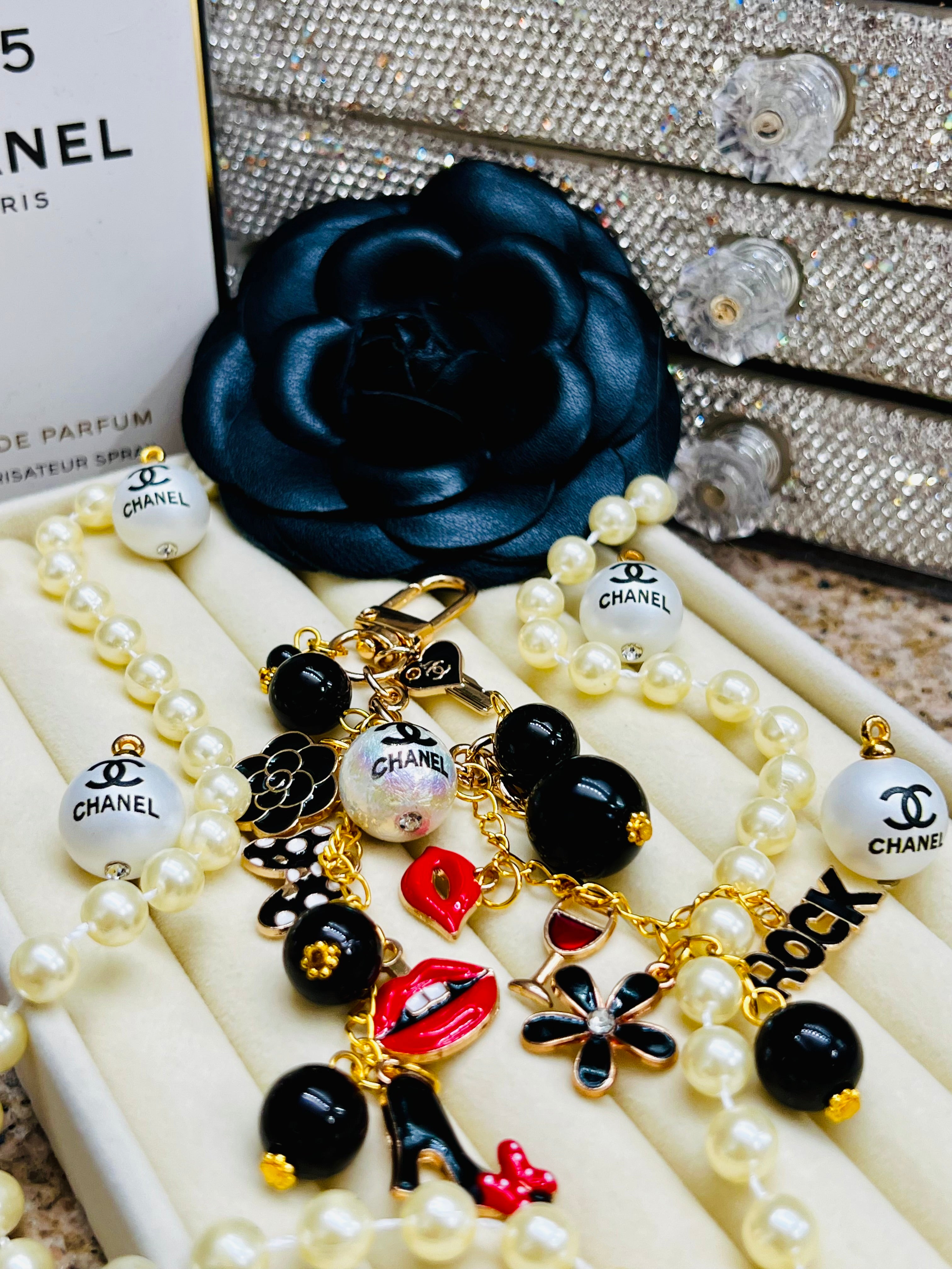 CHANEL Black & Gold Charm Keychain