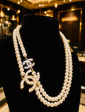 Vintage Chanel Double Strand Faux Pearl Necklace with Crystal Interlocking CC Charms