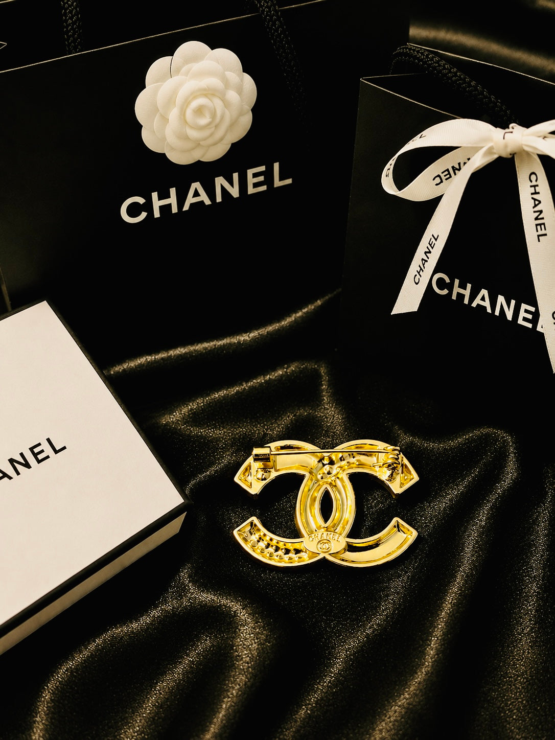 Chanel Elegant Woven Iconic Black & Gold Channel Crystal Brooch