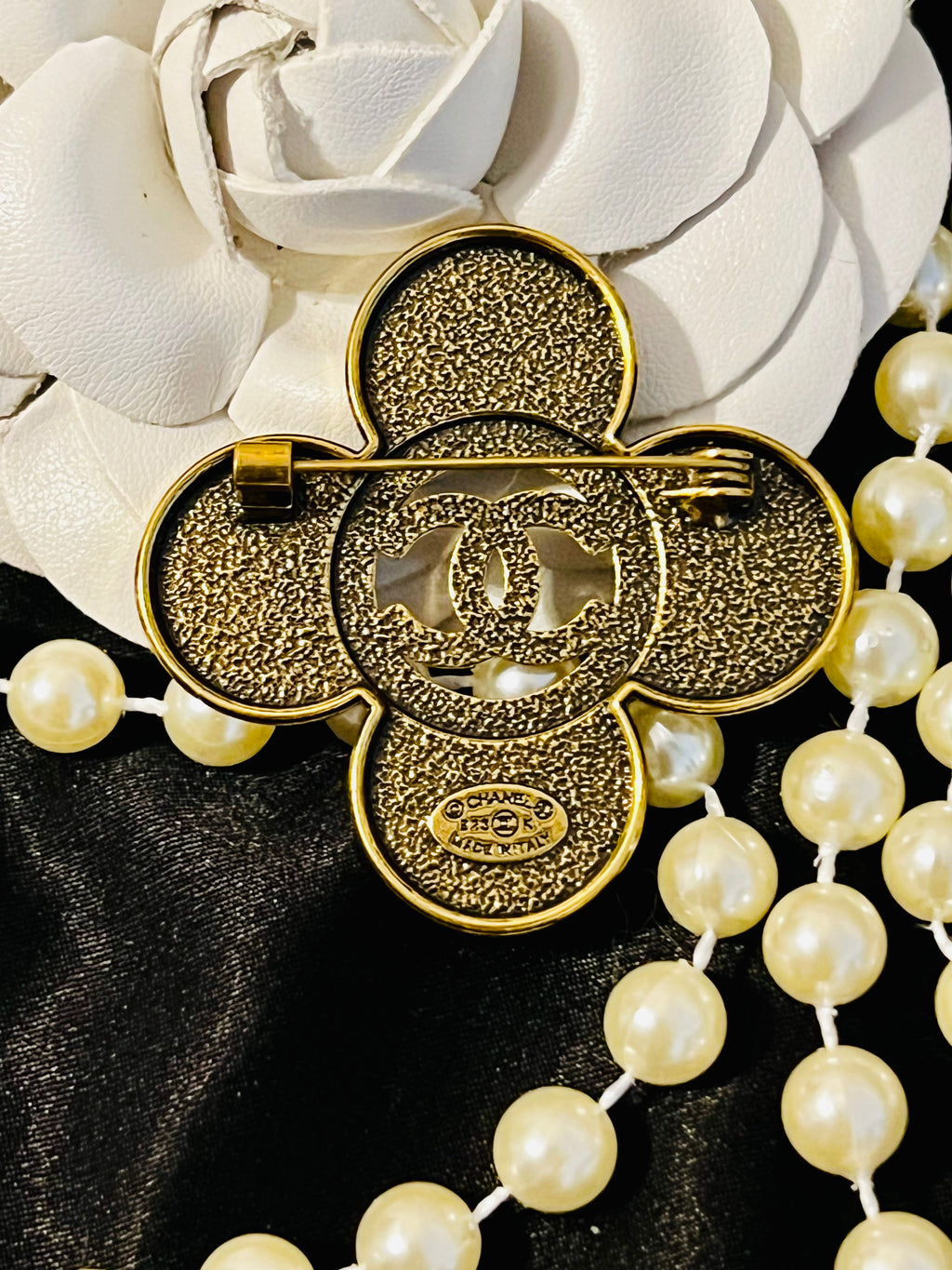 Urbane Bronze Chanel Logo Ancient Brooch