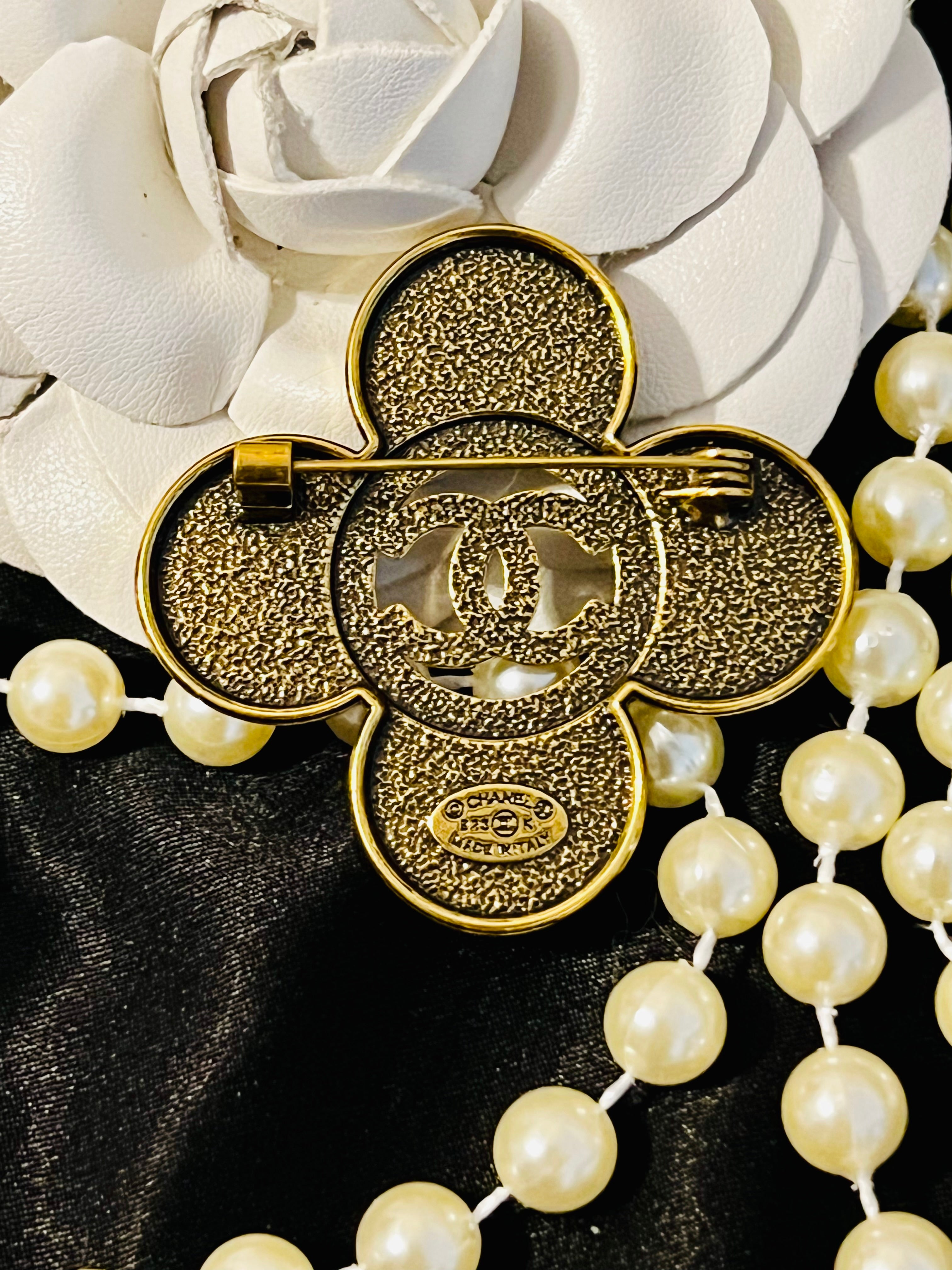 Urbane Bronze Chanel Logo Ancient Brooch