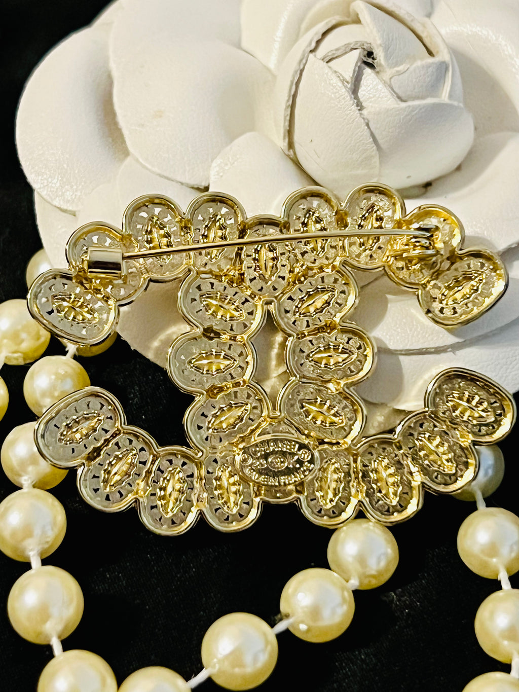 CHANEL Gold with Crystal Accent Brooch Featuring a Unique Design  I