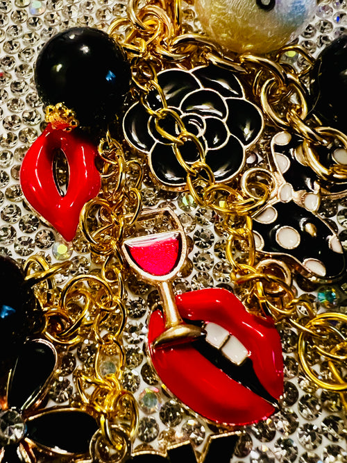 CHANEL Black & Gold Charm Keychain