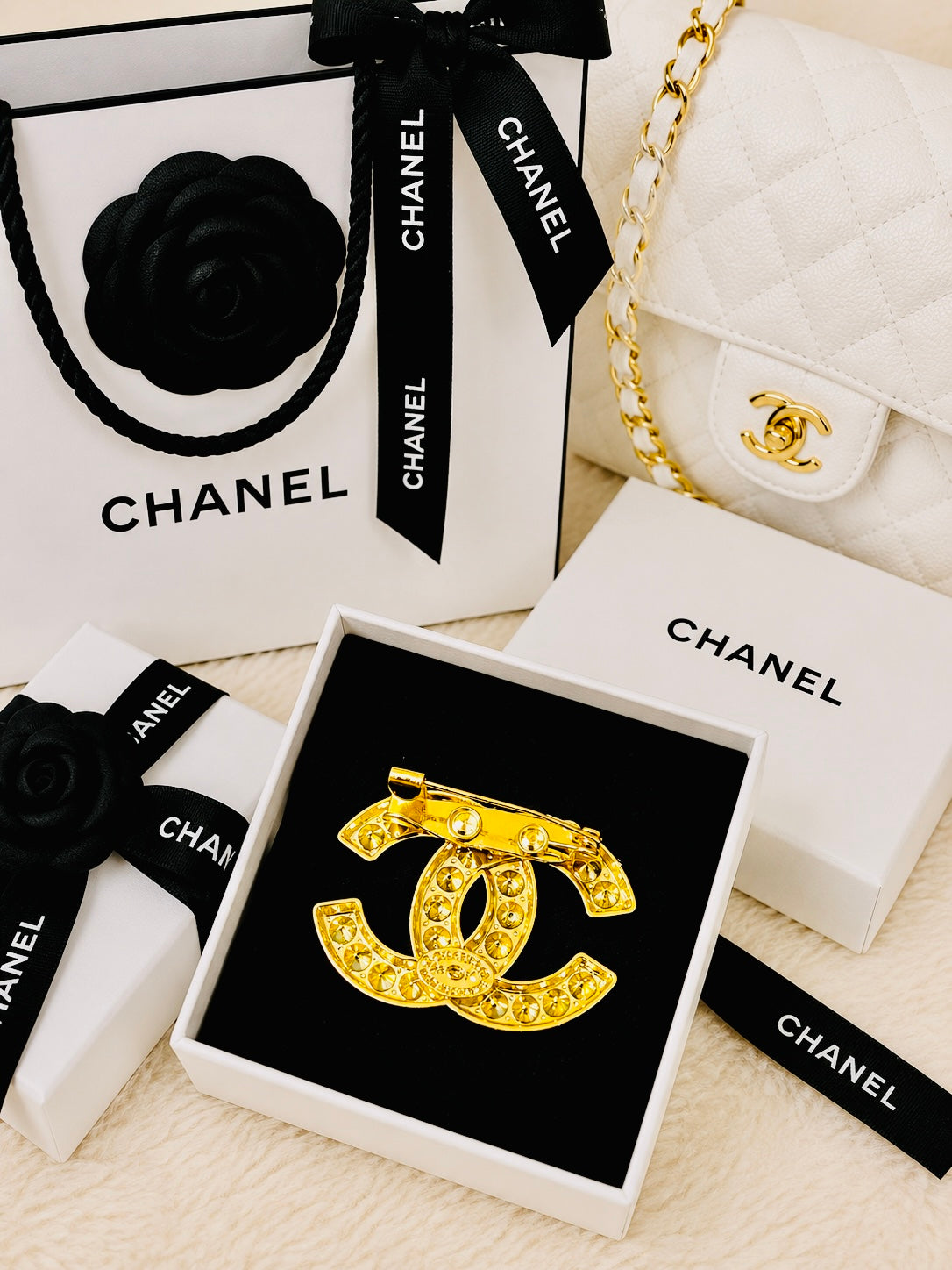 Chanel Gold Channeled Crystal Brooch