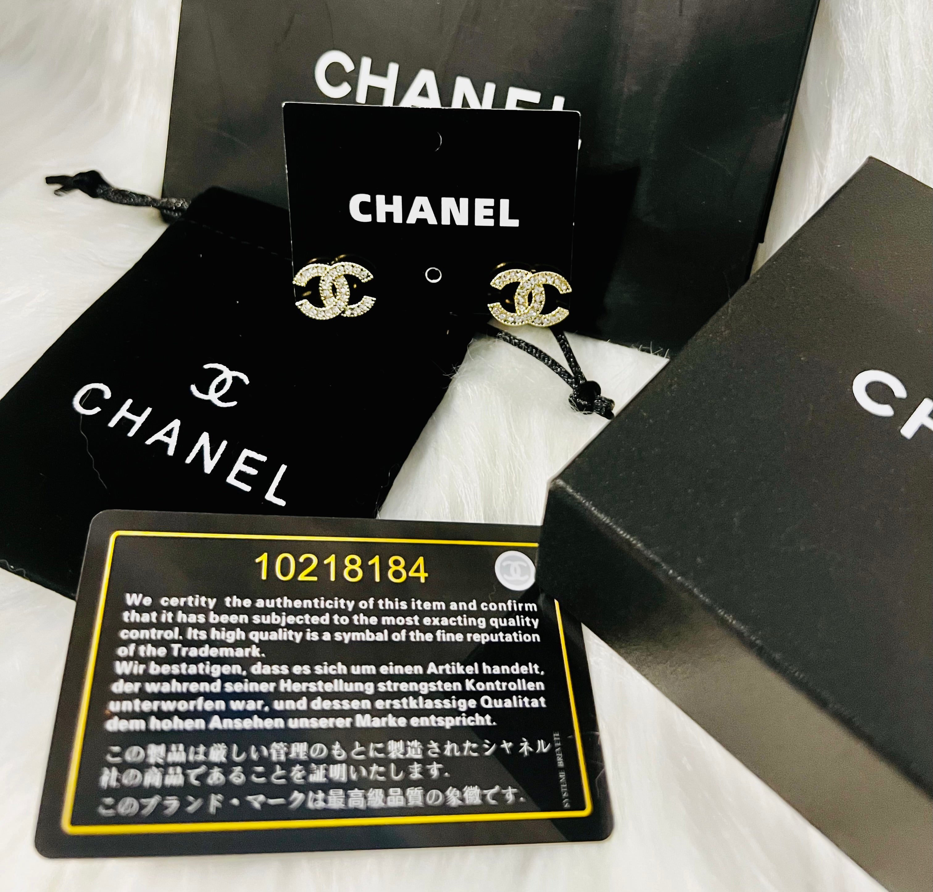 CHANEL Gold with Rhinestone Accent Stud Earrings