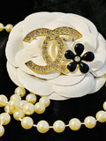 CHANEL Gold Rhinestone with Black Flower Brooch