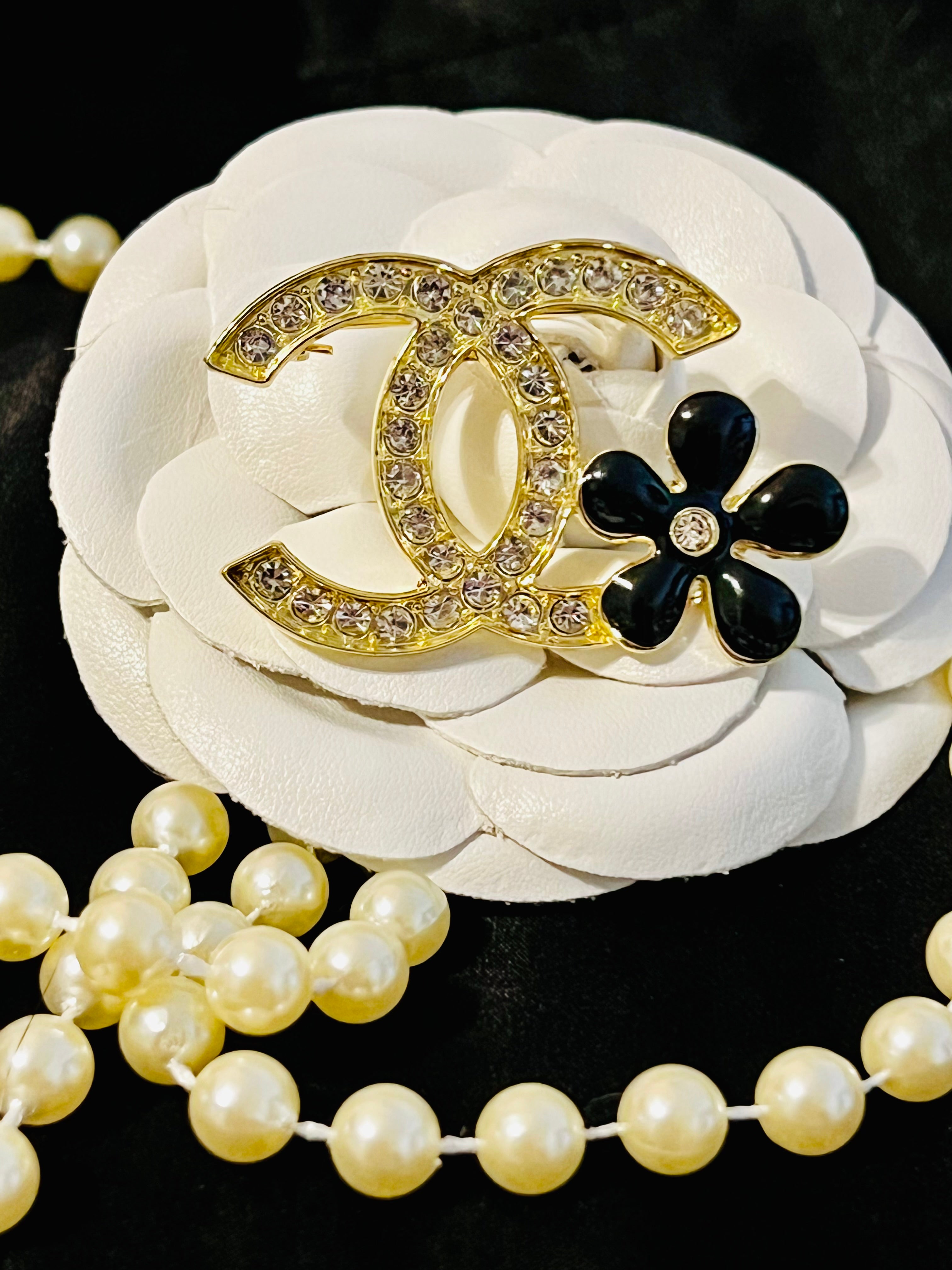 CHANEL Gold Rhinestone with Black Flower Brooch