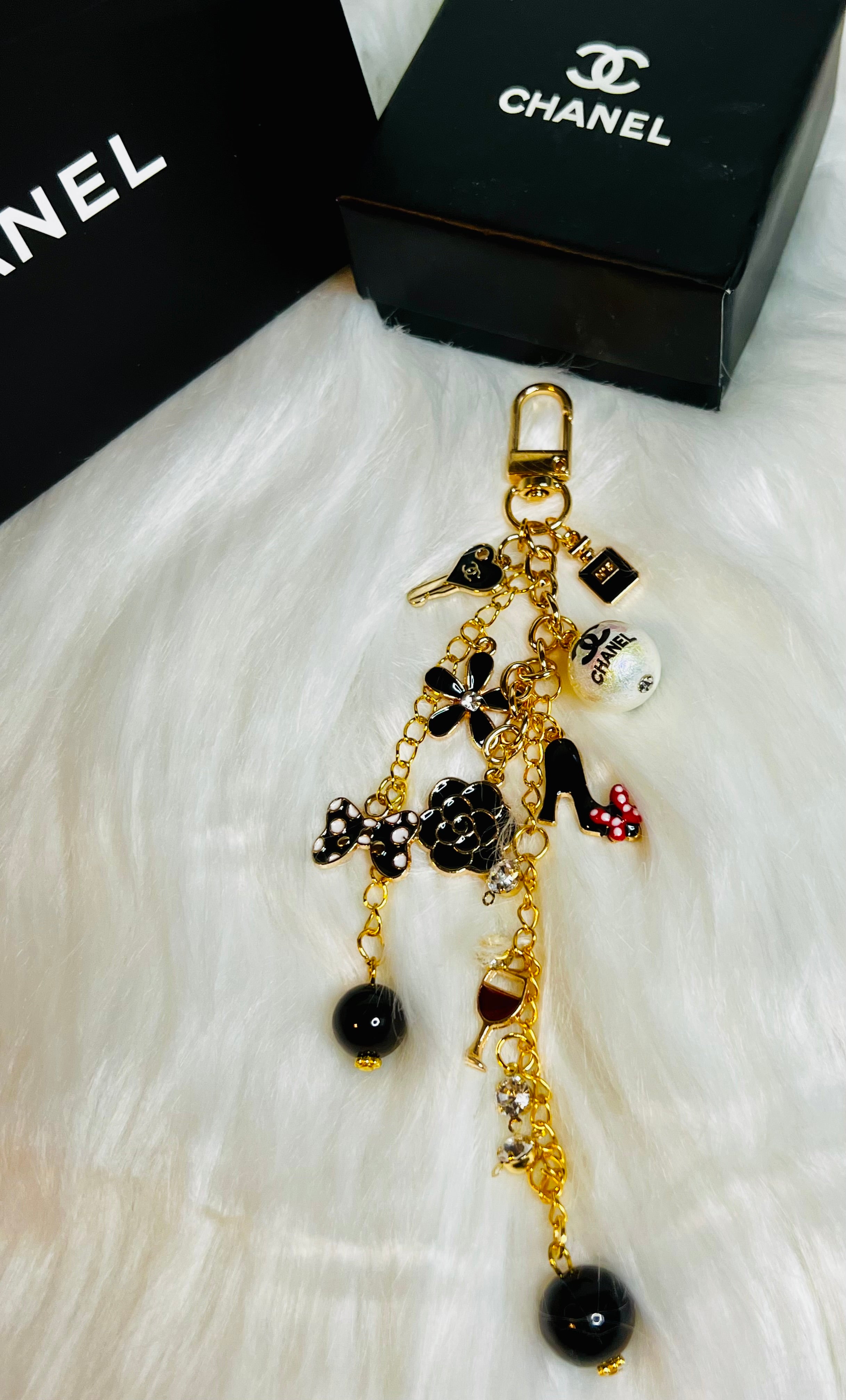 CHANEL Black & Gold Charm Keychain