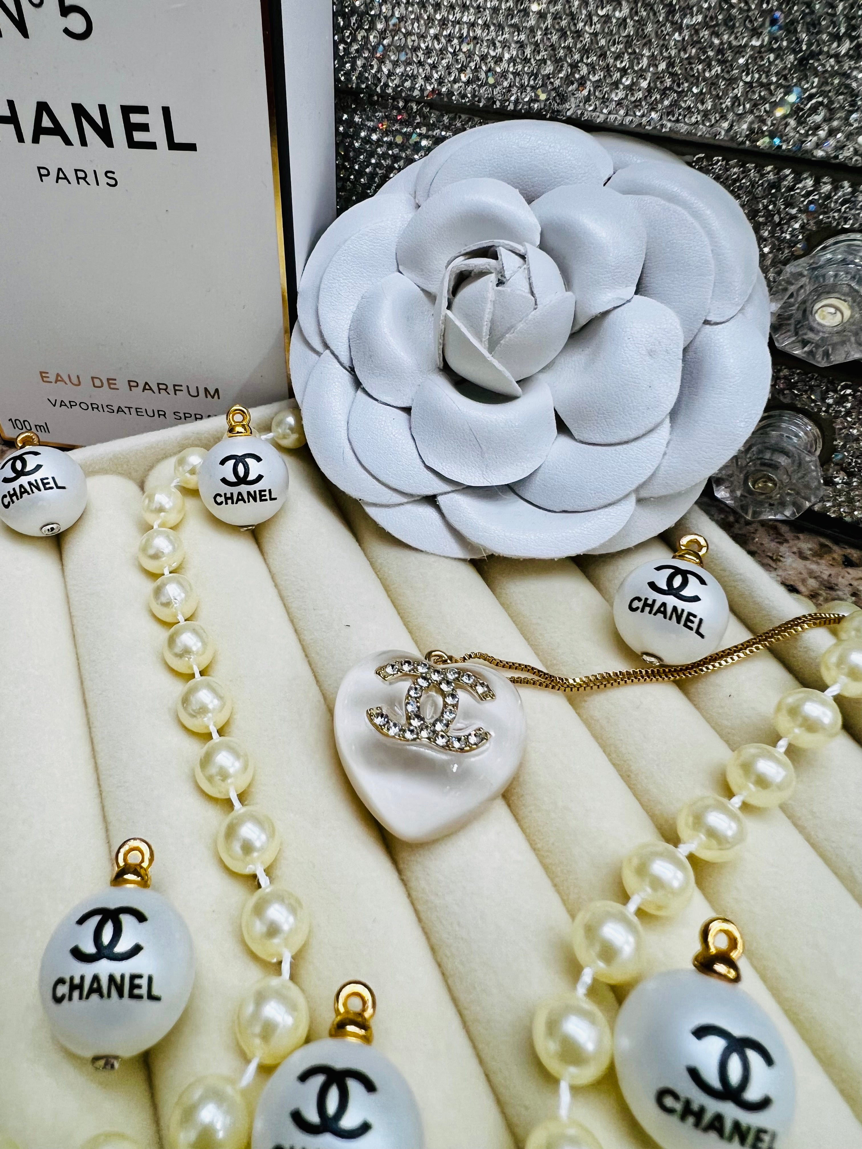 CHANEL White Stone with Gold Lettering Heart Pendant Necklace