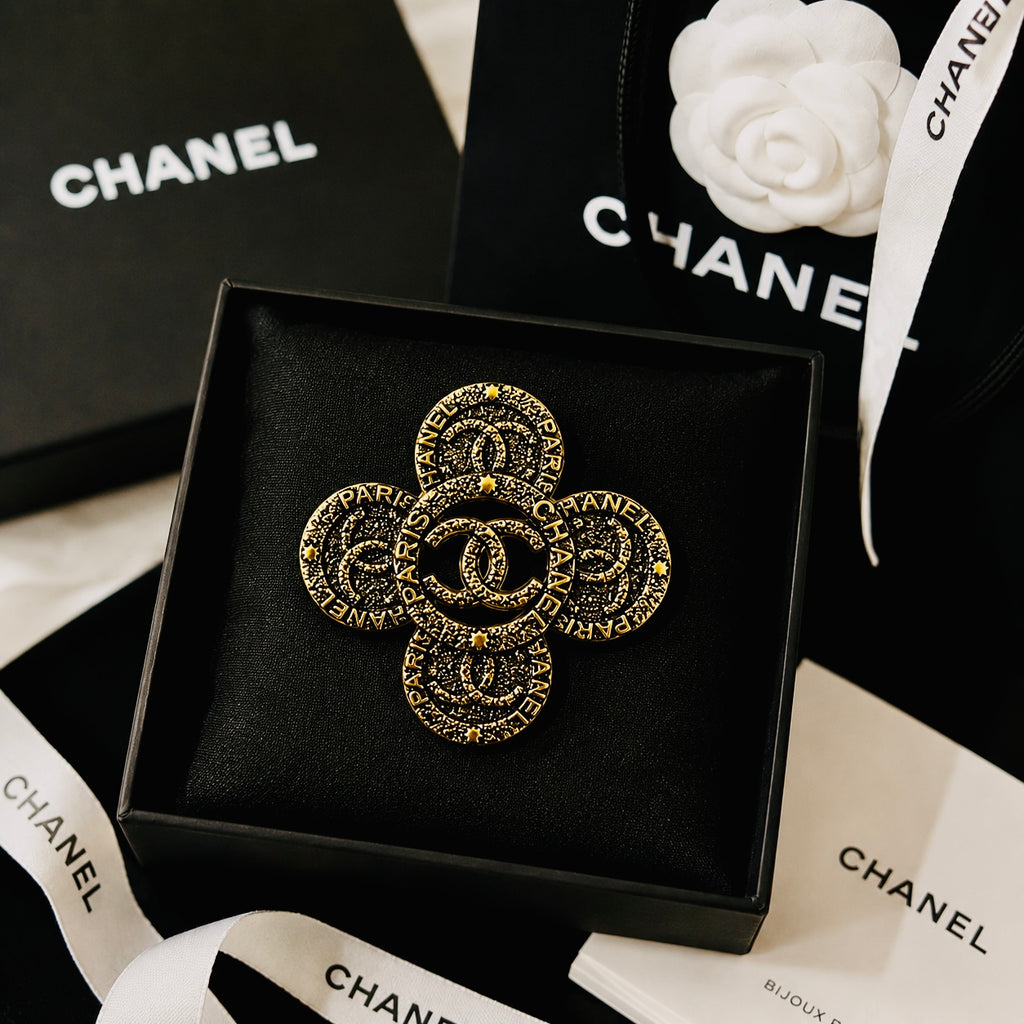 Urbane Bronze Chanel Logo Ancient Brooch