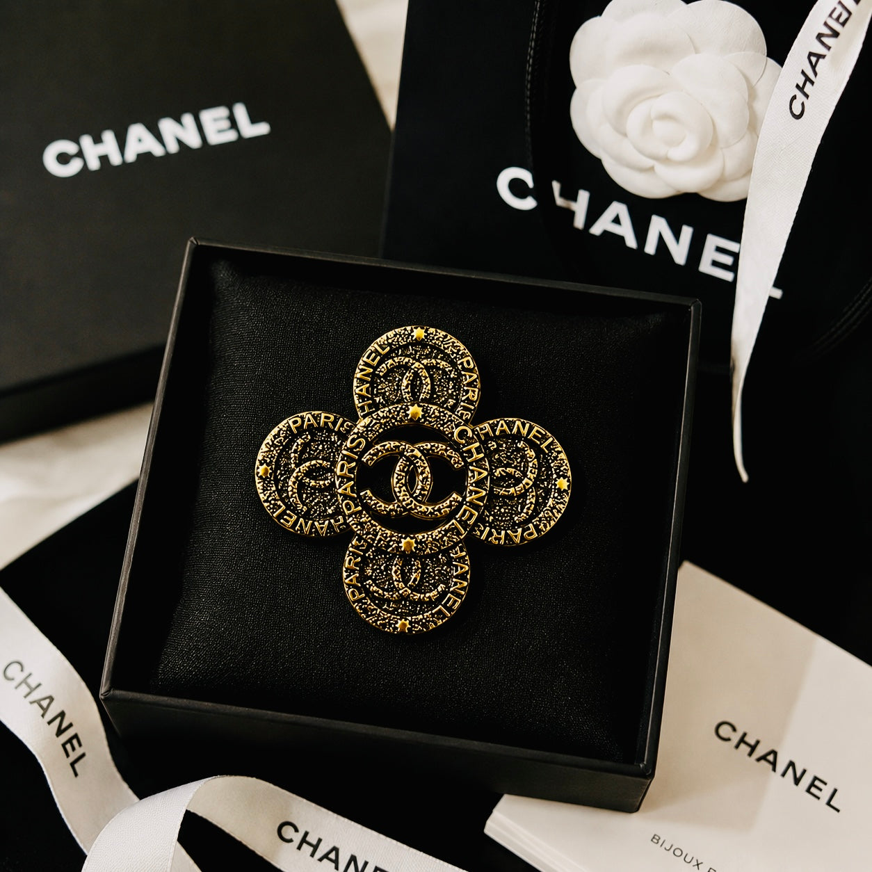Urbane Bronze Chanel Logo Ancient Brooch