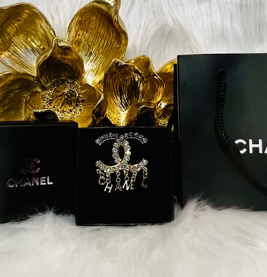 CHANEL Unique Brooch Featuring Gold Crystal Accents with Iconic Drop Logo A