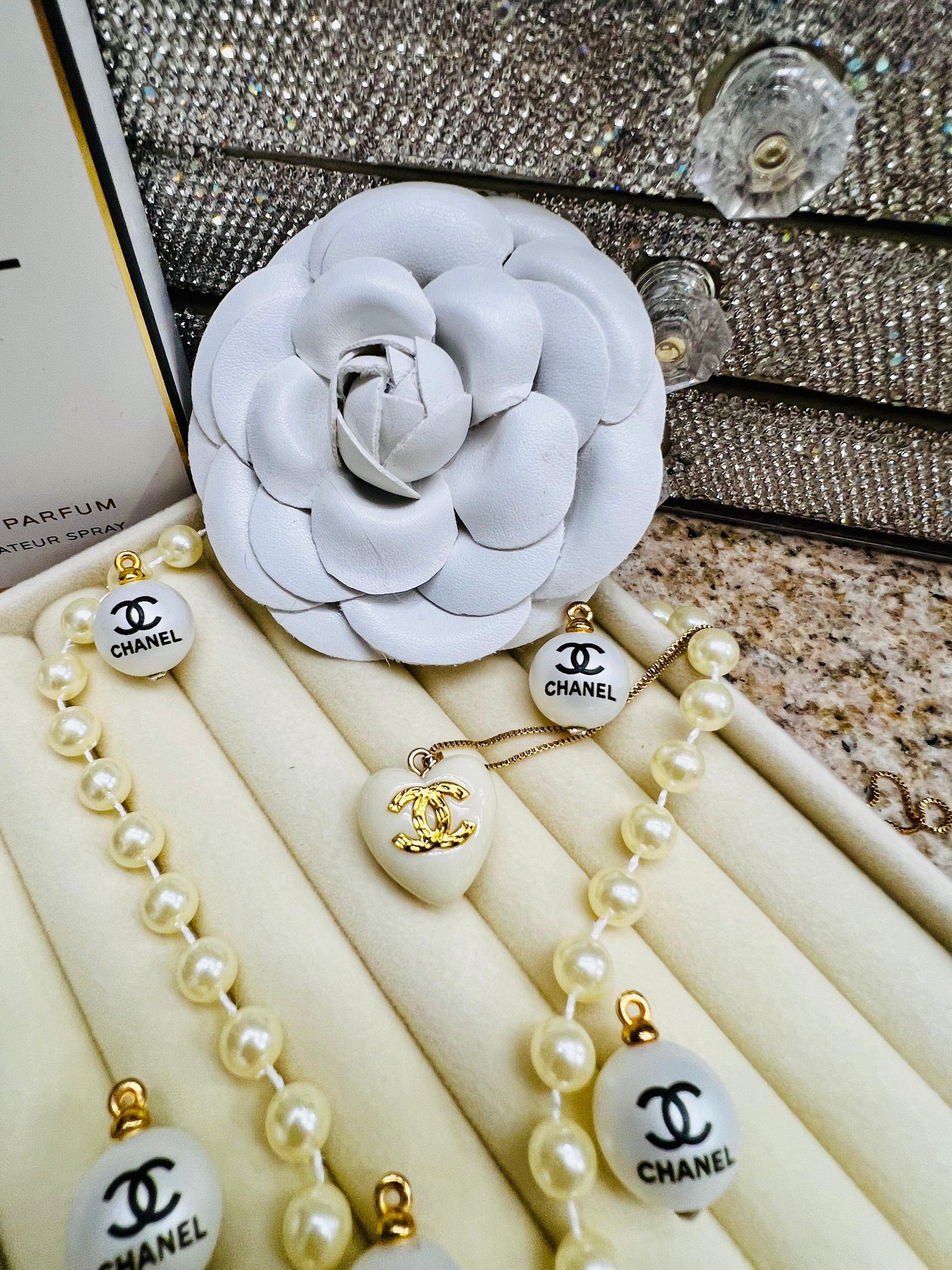 CHANEL White Stone with Gold Lettering Heart Pendant Necklace