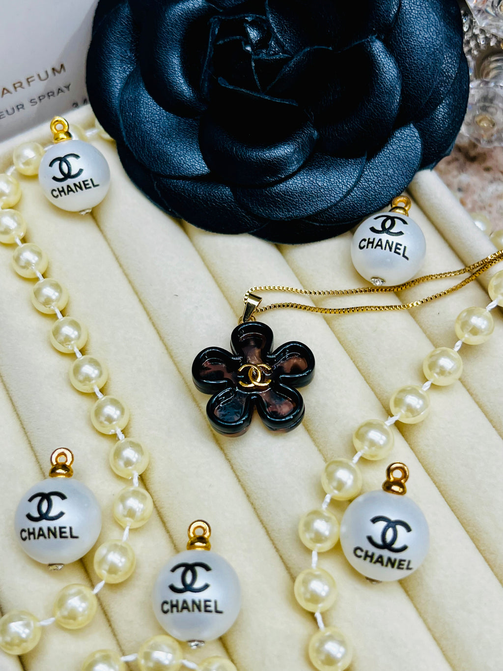 CHANEL Cheetah Print with Gold Lettering Flower Style Pendant Necklace