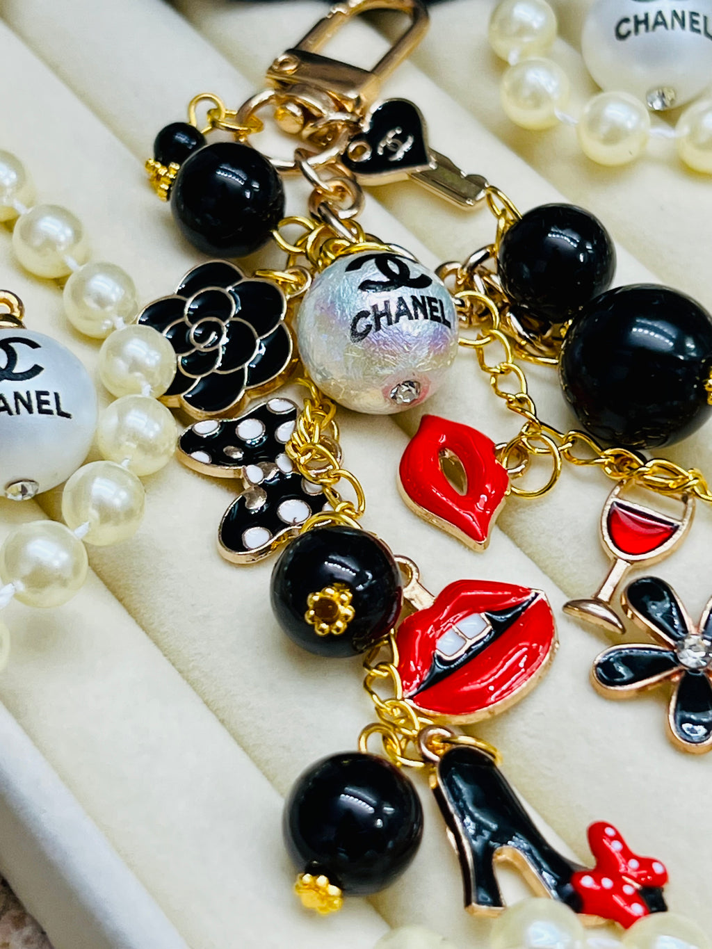 CHANEL Black & Gold Charm Keychain