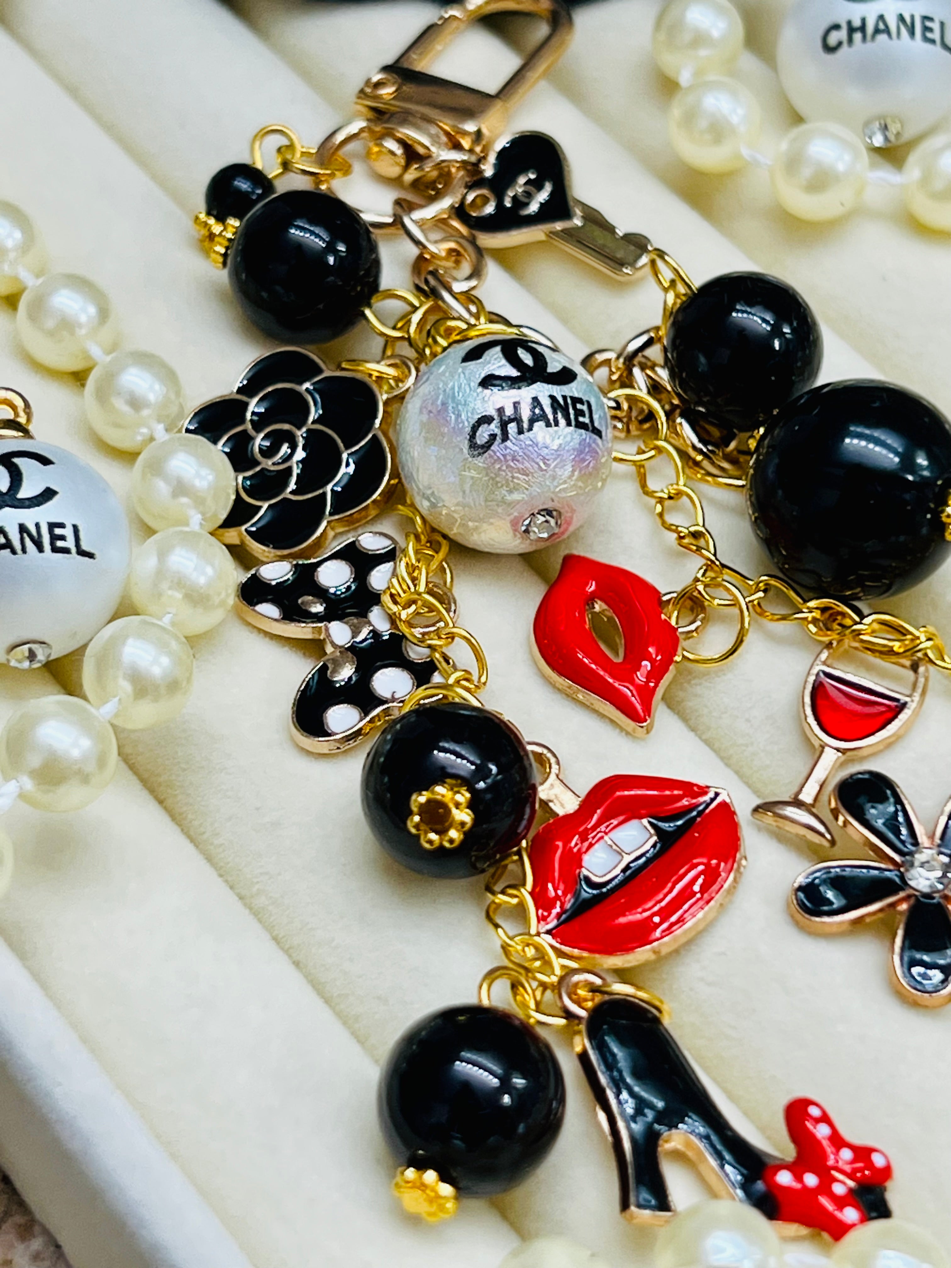 CHANEL Black & Gold Charm Keychain