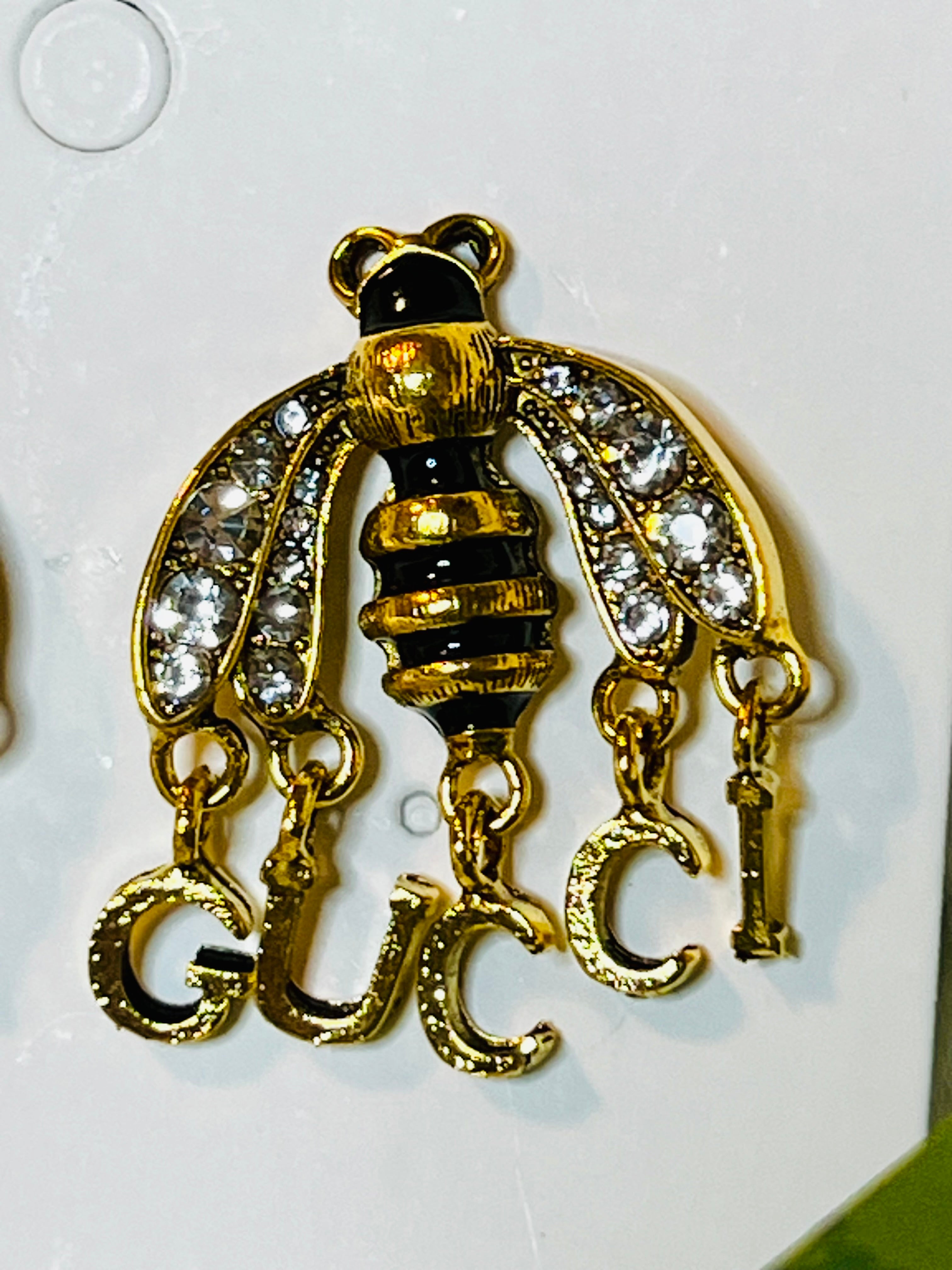 Gucci Unique Gold & Black Bee with Rhinestone Wings Drop Down Logo