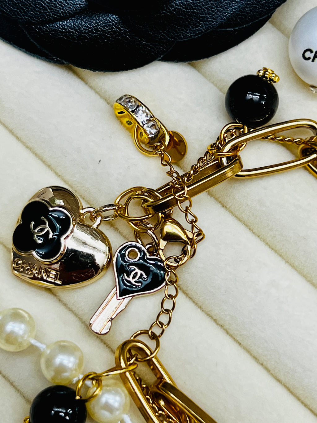 CHANEL Gold & Black Charm Chain Bracelet Heart Dangle
