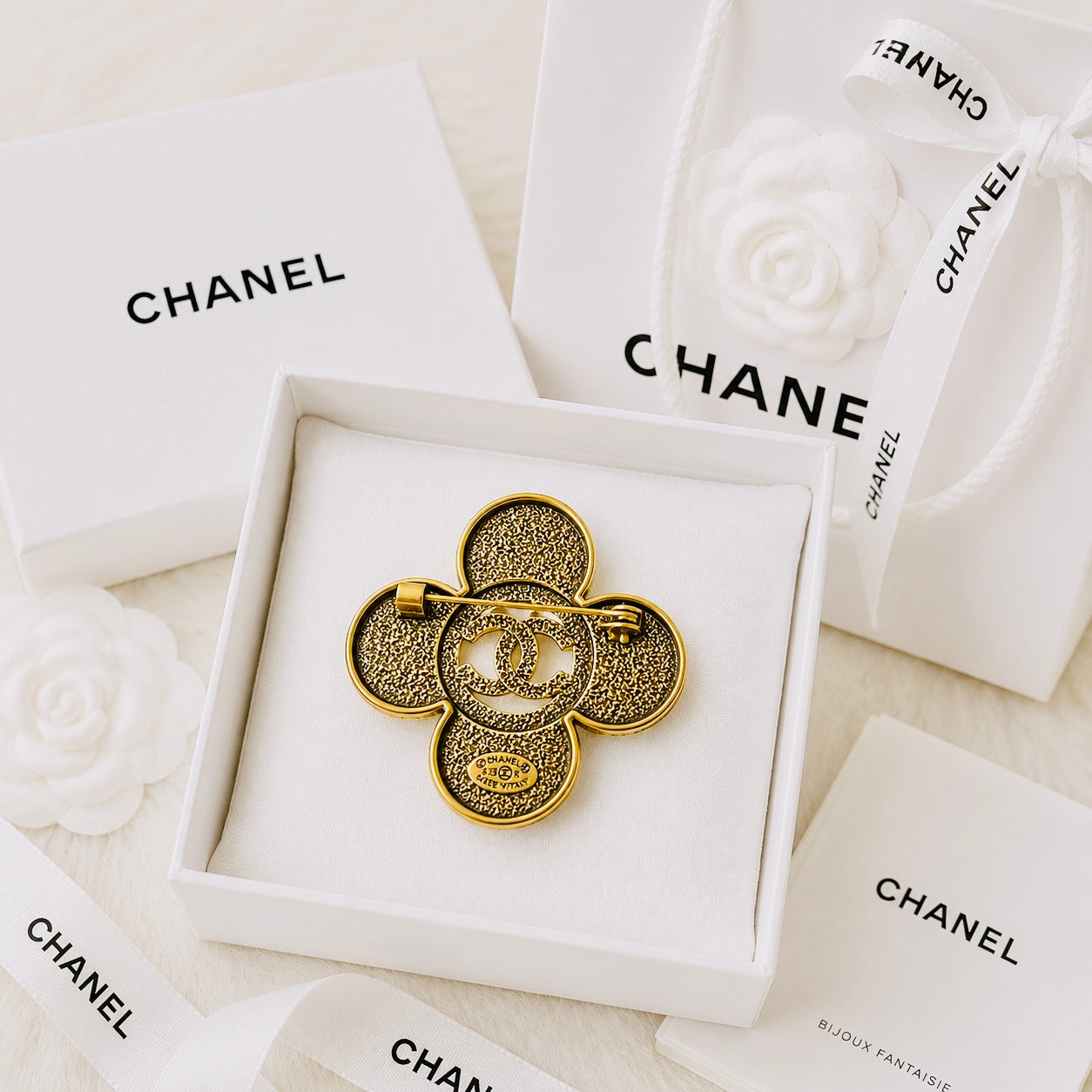 Urbane Bronze Chanel Logo Ancient Brooch