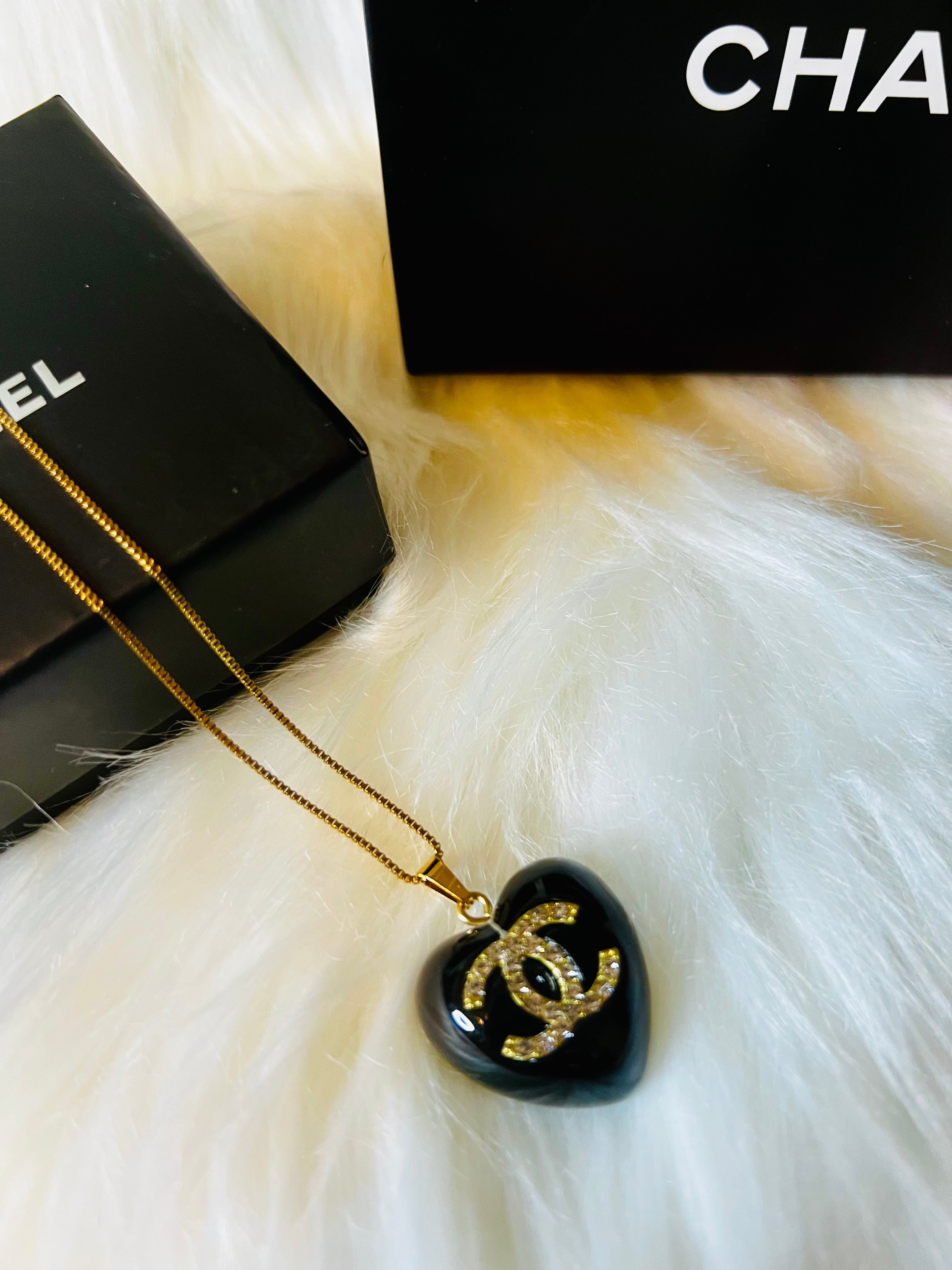 CHANEL Black Stone with Gold Lettering Heart Pendant Necklace