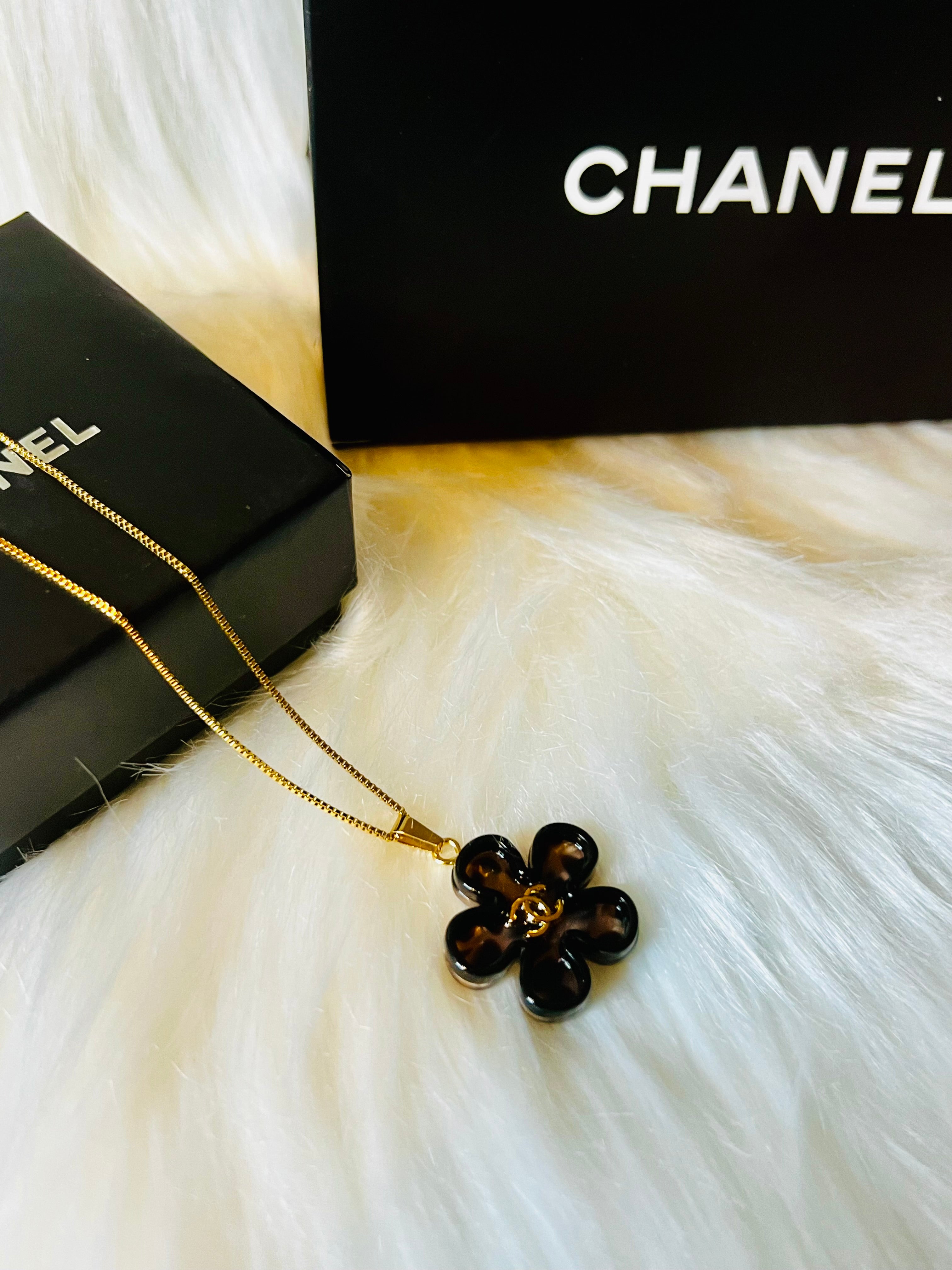 CHANEL Cheetah Print with Gold Lettering Flower Style Pendant Necklace