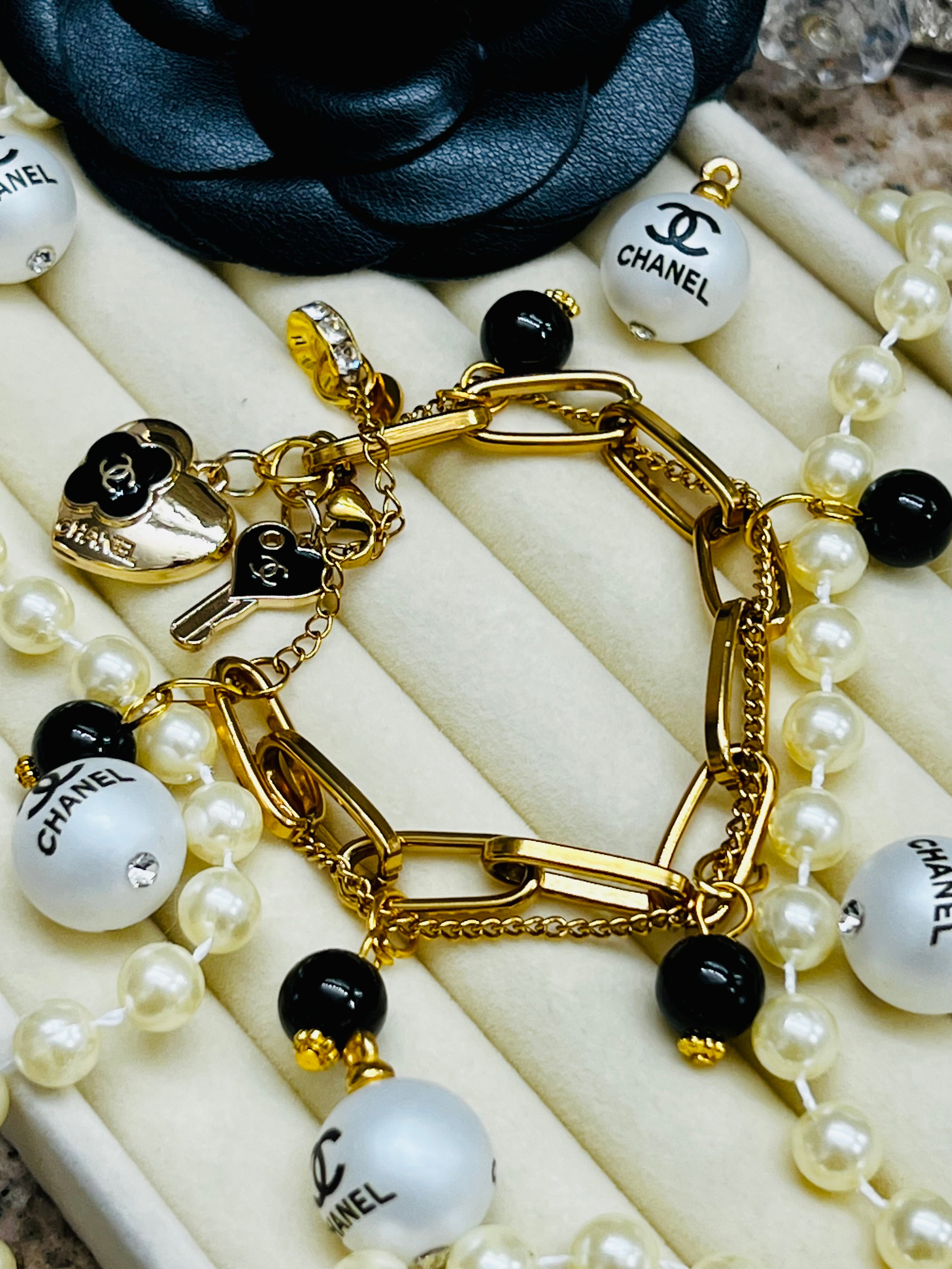 CHANEL Gold & Black Charm Chain Bracelet Heart Dangle
